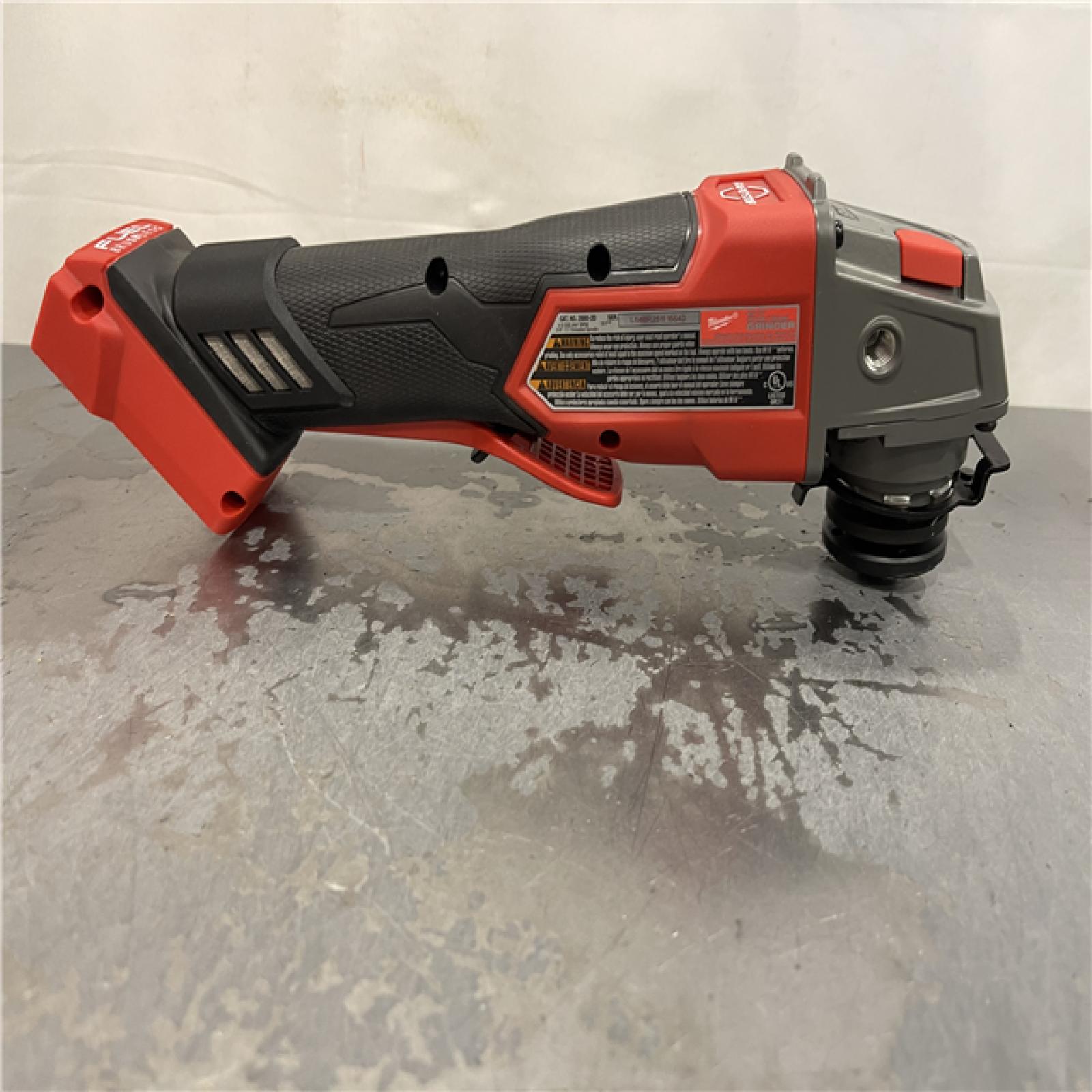 AS-IS - Milwaukee M18 FUEL 18V Lithium-Ion Brushless Cordless 4-1/2 in./5 in. Grinder w/Paddle Switch