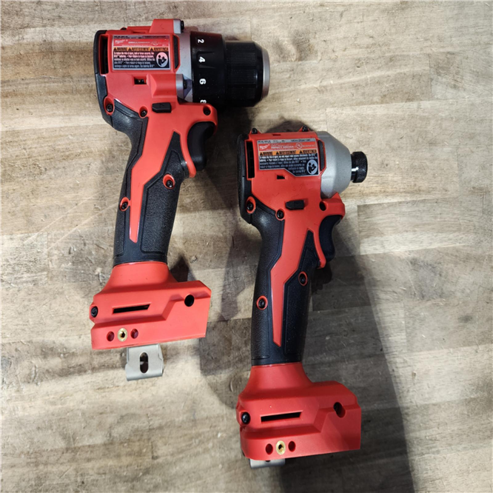 HOUSTON LOCATION - AS-IS Milwaukee M18 18V Lithium-Ion Brushless Cordless Compact Drill/Impact Combo Kit (2-Tool) W/(2) 2.0 Ah Batteries  Charger & Bag