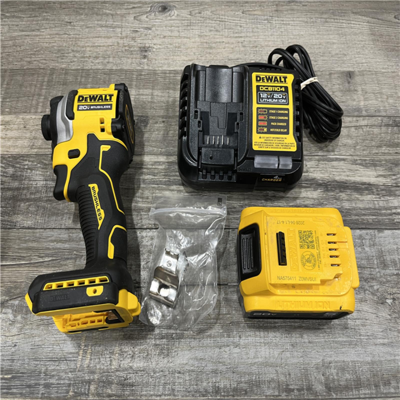 AS-IS DEWALT ATOMIC 20V MAX Lithium-Ion Cordless 1/4 in. Brushless Impact Driver Kit