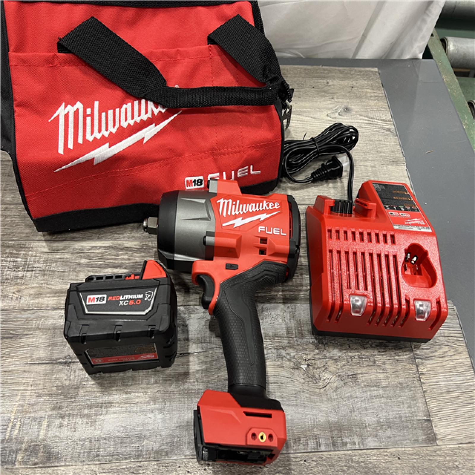 AS-IS Milwaukee 2967-21B M18 FUEL 1/2 High Torque Impact Wrench W/ Friction Ring 5.0Ah Kit