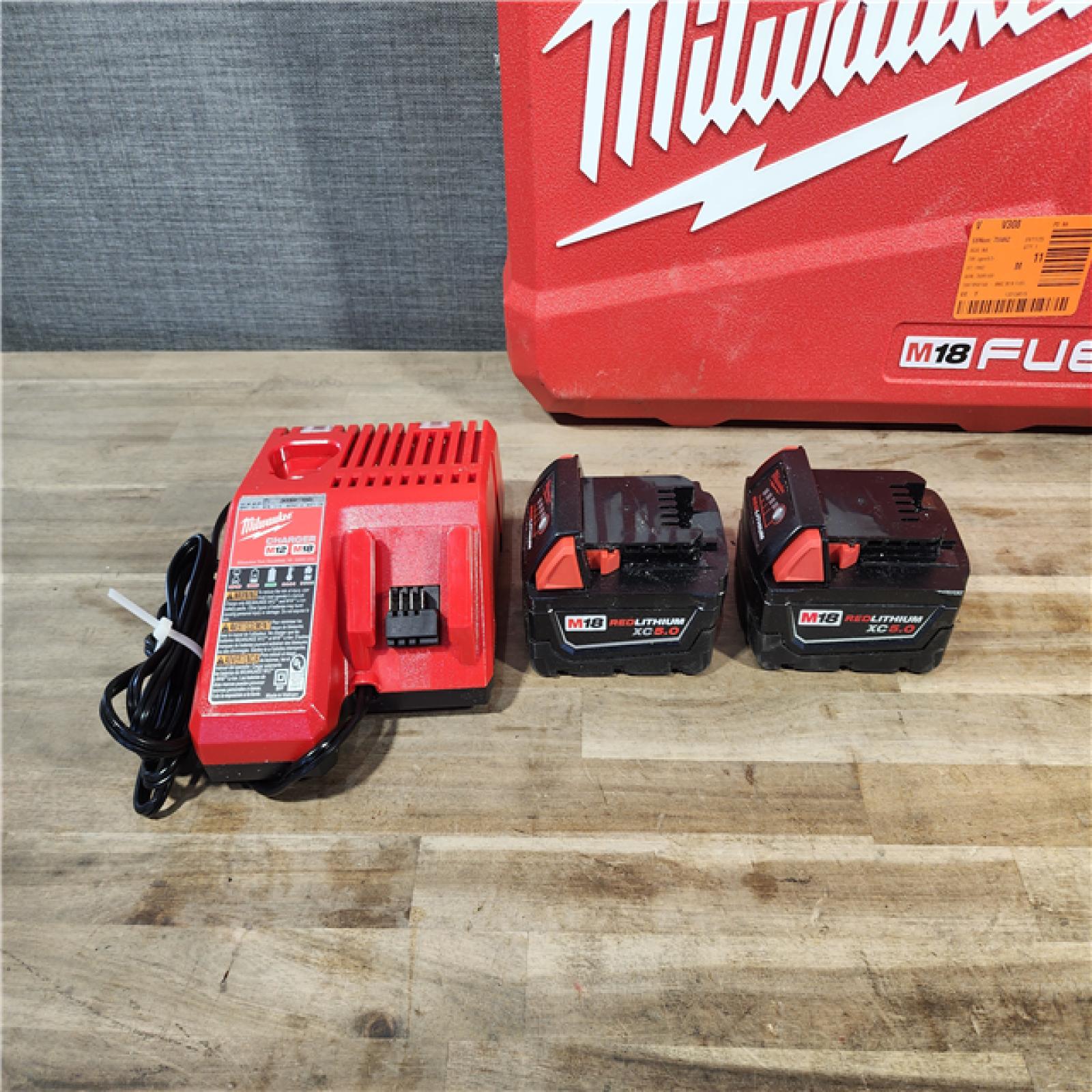 HOUSTON LOCATION - AS-IS MILWAUKEE FUEL 18V Lithium-Ion Brushless Cordless Hammer Drill and Impact Driver Combo Kit