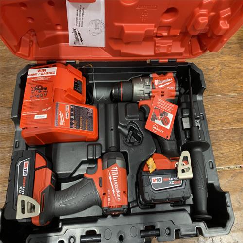 AS-IS MILWAUKEE M18 FUEL 18V Lithium-Ion Brushless Cordless Hammer Drill and Impact Driver Combo Kit (2-Tool) with 2 Batteries