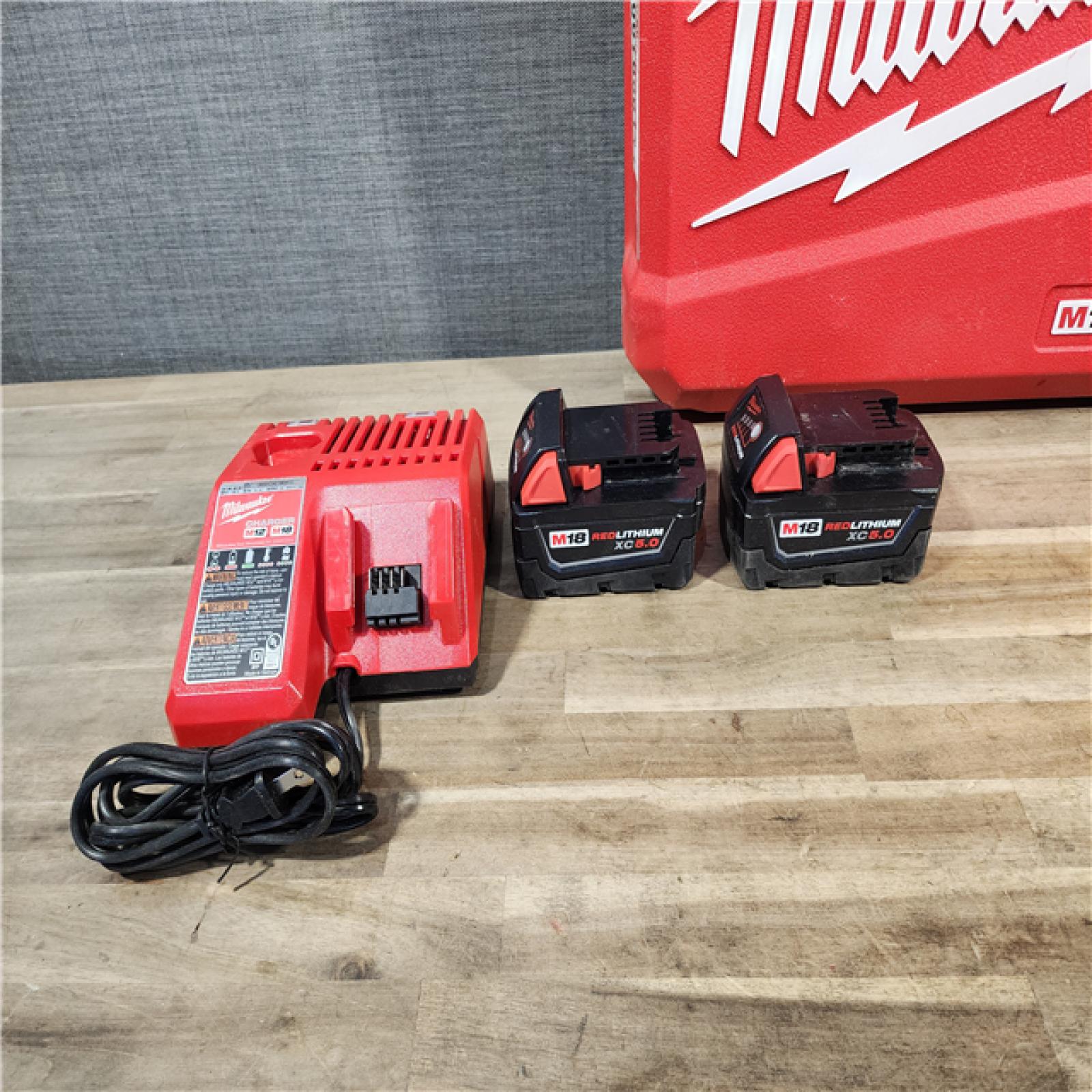 HOUSTON LOCATION - AS-IS MILWAUKEE FUEL 18V Lithium-Ion Brushless Cordless Hammer Drill and Impact Driver Combo Kit