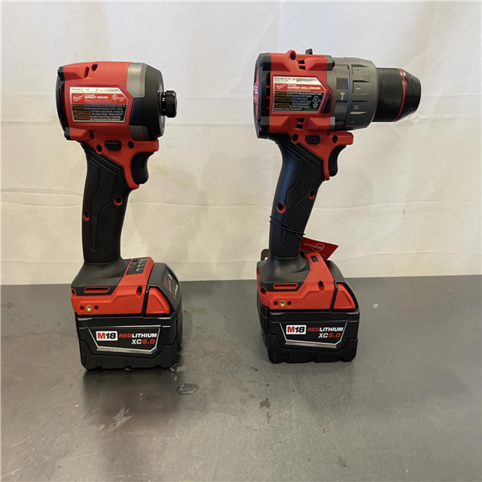 AS-IS- MILWAUKEE FUEL 18V Lithium-Ion Brushless Cordless Hammer Drill and Impact Driver Combo Kit