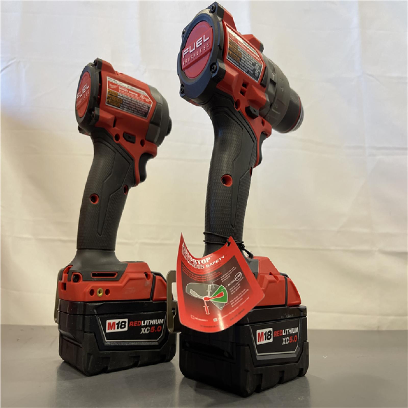 AS-IS - MILWAUKEE FUEL 18V Lithium-Ion Brushless Cordless Hammer Drill and Impact Driver Combo Kit