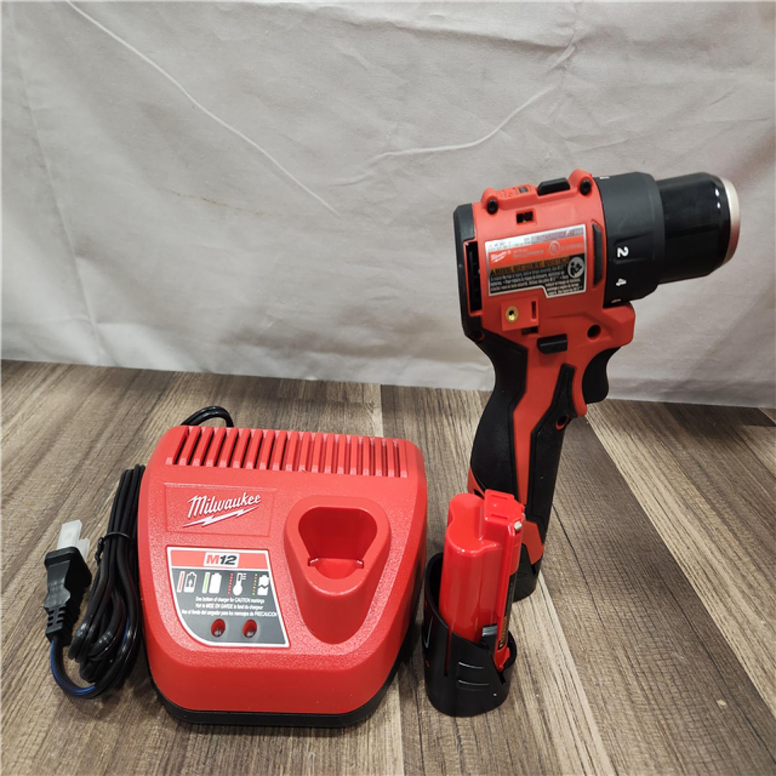 AS-IS- Milwaukee Tool M12 3/8 in. Brushless Cordless Drill/Driver Kit (Battery & Charger)
