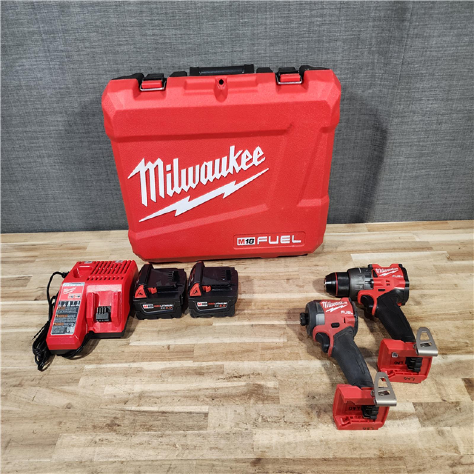 HOUSTON LOCATION - AS-IS Milwaukee FUEL 18V Lithium-Ion Brushless Cordless Hammer Drill and Impact Driver Combo Kit