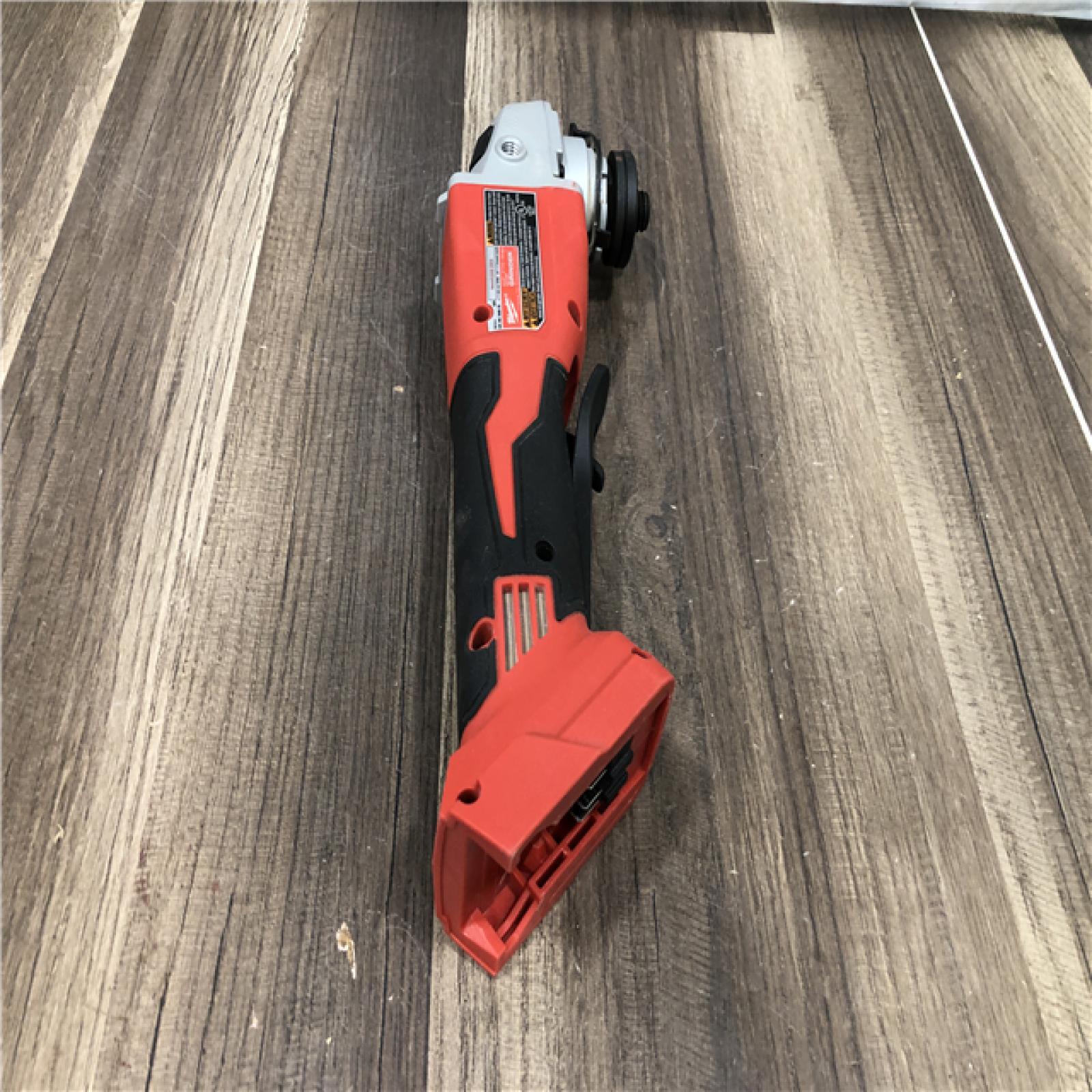 AS-IS Milwaukee 18V Lithium-Ion Brushless Cordless 4-1/2 in./5 in. Grinder w/Paddle Switch (Tool-Only)