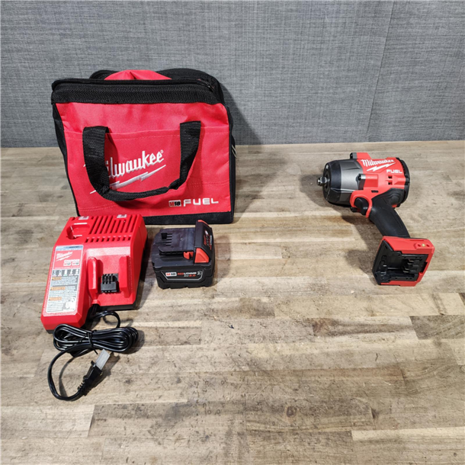 HOUSTON LOCATION - AS-IS Milwaukee M18 1/2 in. Cordless Brushless High Torque Impact Wrench Kit (Battery & Charger)