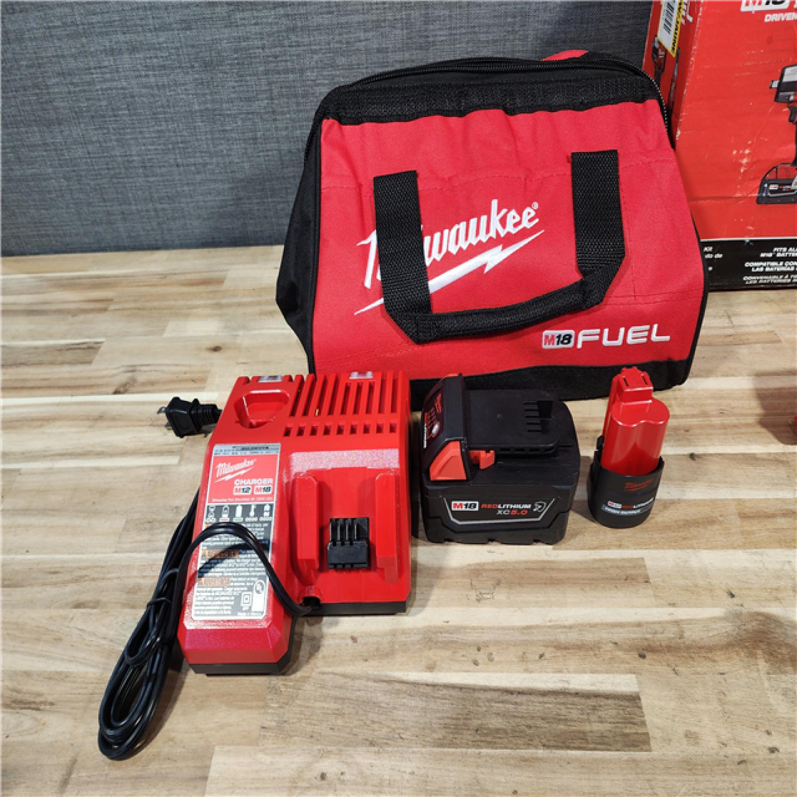 HOUSTON LOCATION - AS-IS Milwaukee FUEL 18V Cordless Mid Torque 1/2 in. Impact Wrench w/ M12 FUEL 3/8 in. Ratchet & Battery/Charger Combo Kit