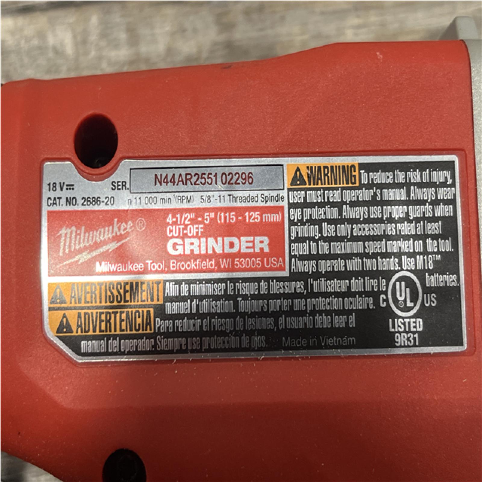 AS-IS Milwaukee 18V Lithium-Ion Brushless Cordless 4-1/2 in./5 in. Grinder w/Paddle Switch (Tool-Only)