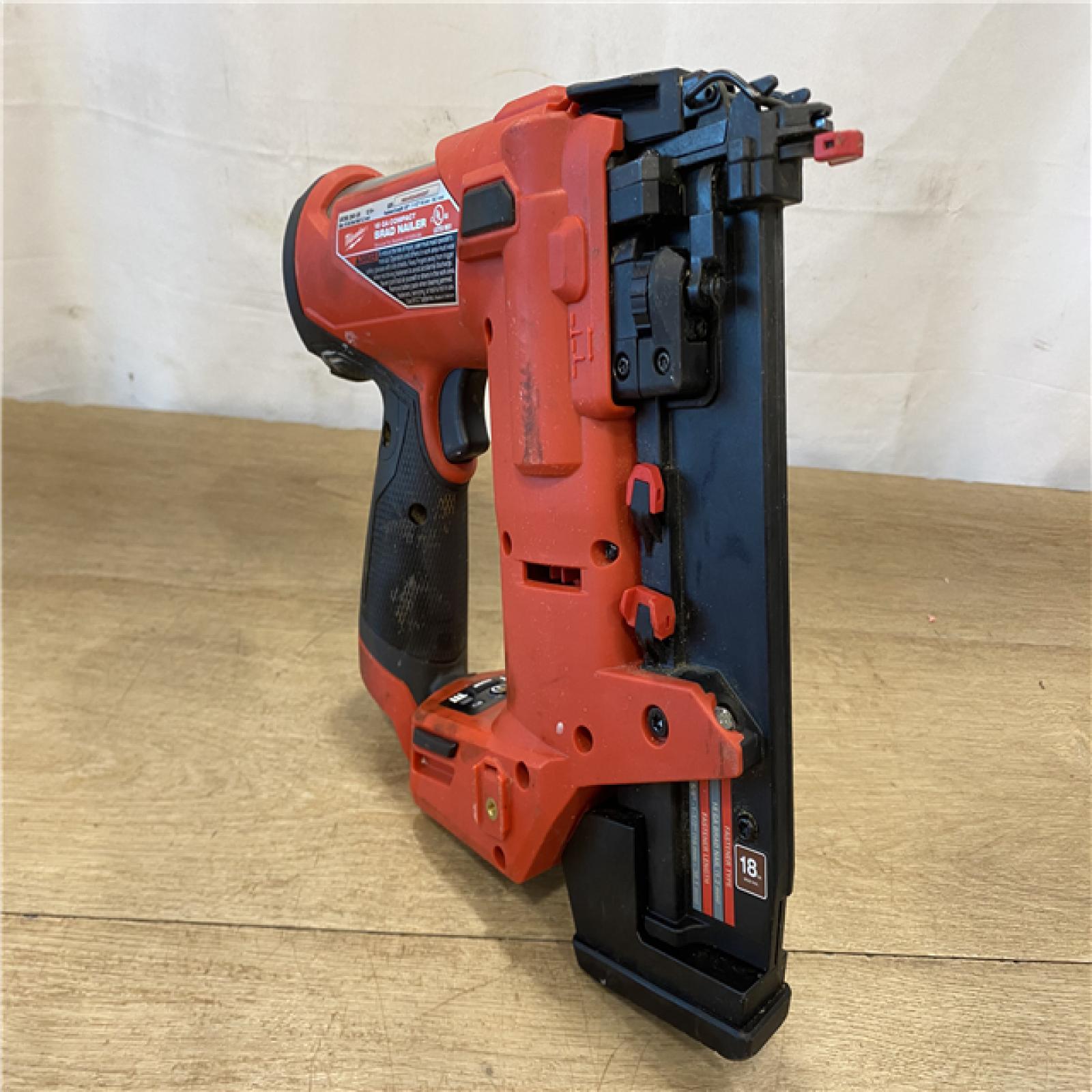 AS-IS Milwaukee FUEL 12-Volt Lithium-Ion Brushless Cordless 18-Gauge 1-1/2 in. Compact Brad Nailer (Tool-Only)