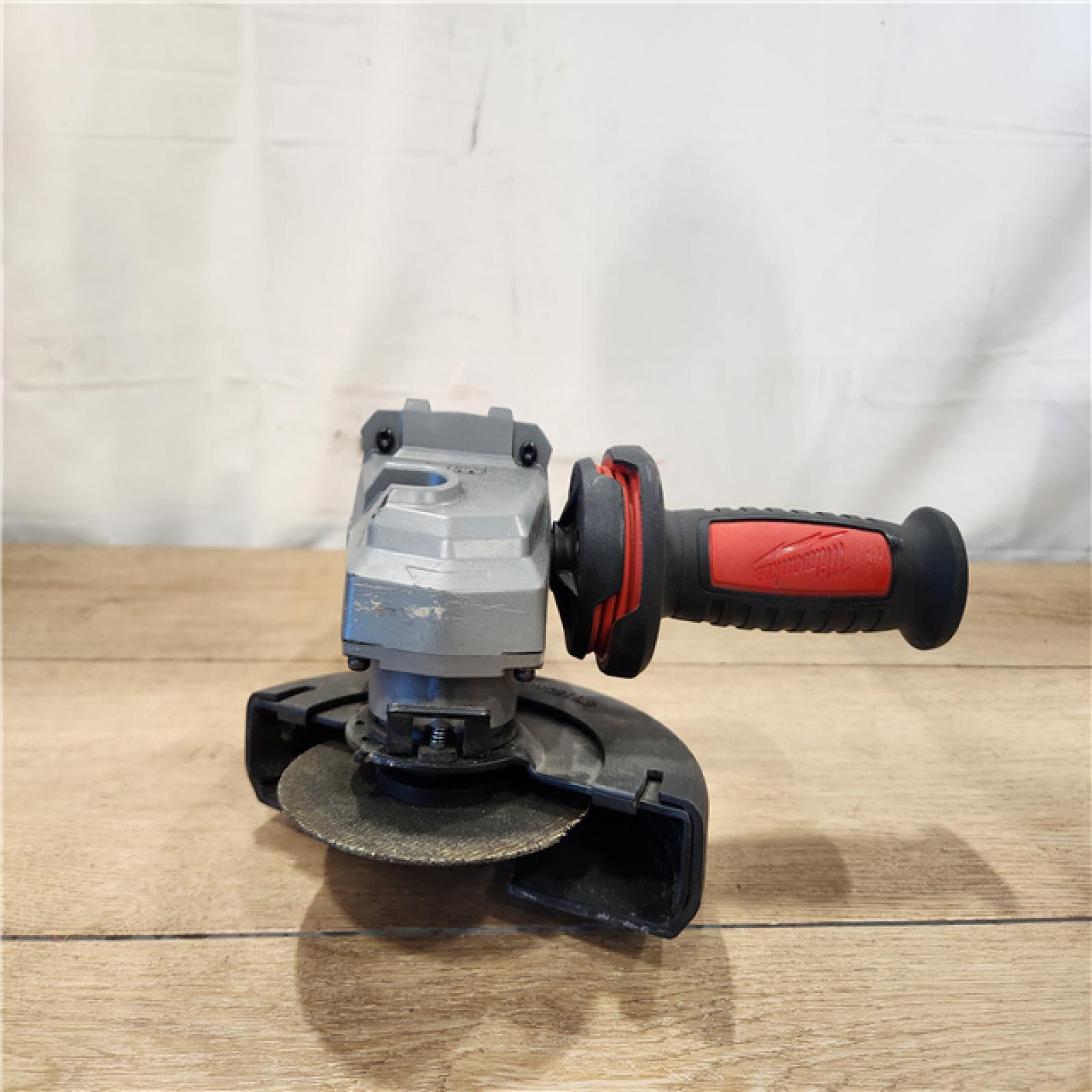 AS-IS- Milwaukee  FUEL 18-Volt Lithium-Ion Brushless Cordless 4-1/2 in./6 in. Braking Grinder with Paddle Switch (Tool-Only)