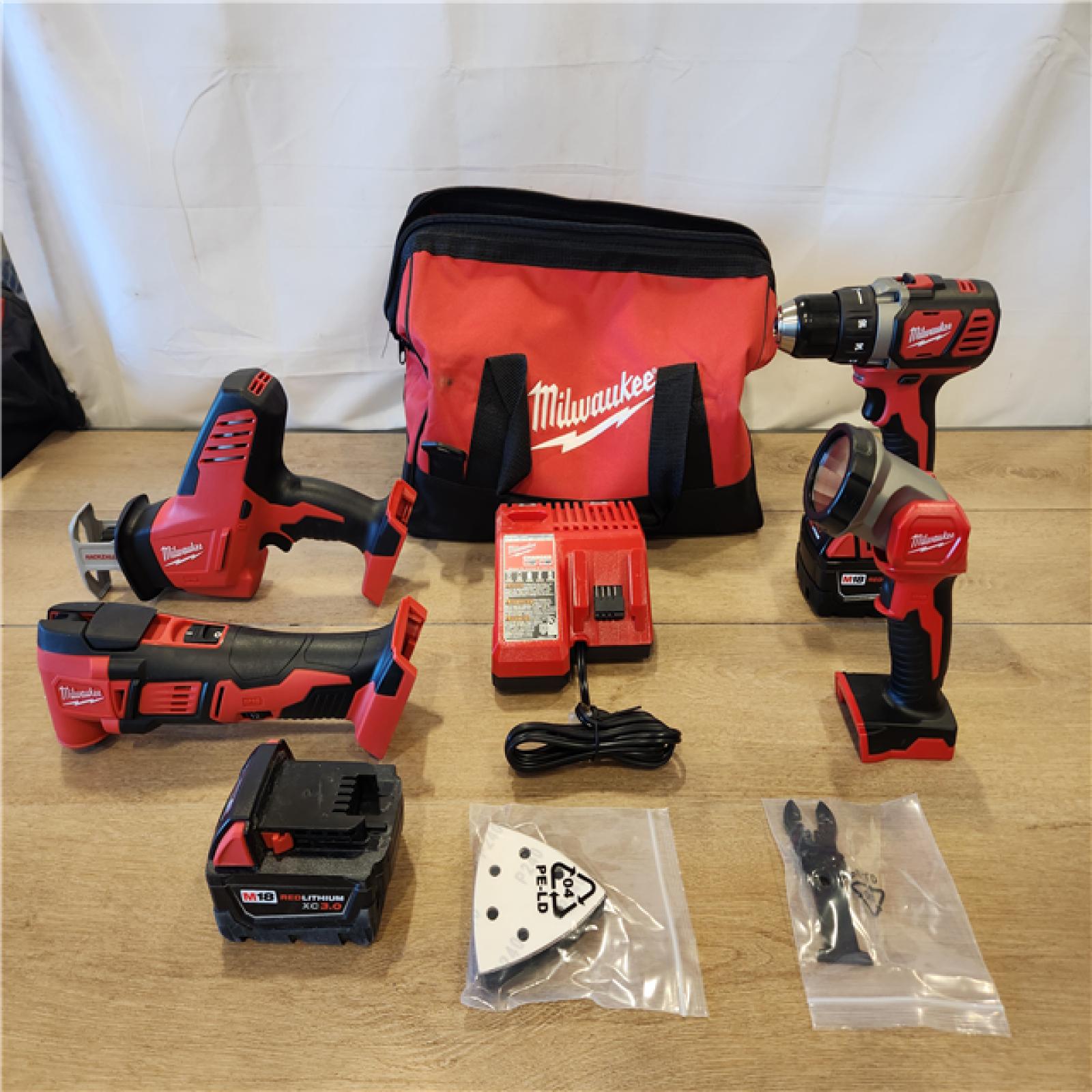 AS-IS- M18 18V Lithium-Ion Cordless Combo Kit (5-Tool) with (2) Batteries  Charger and Tool Bag
