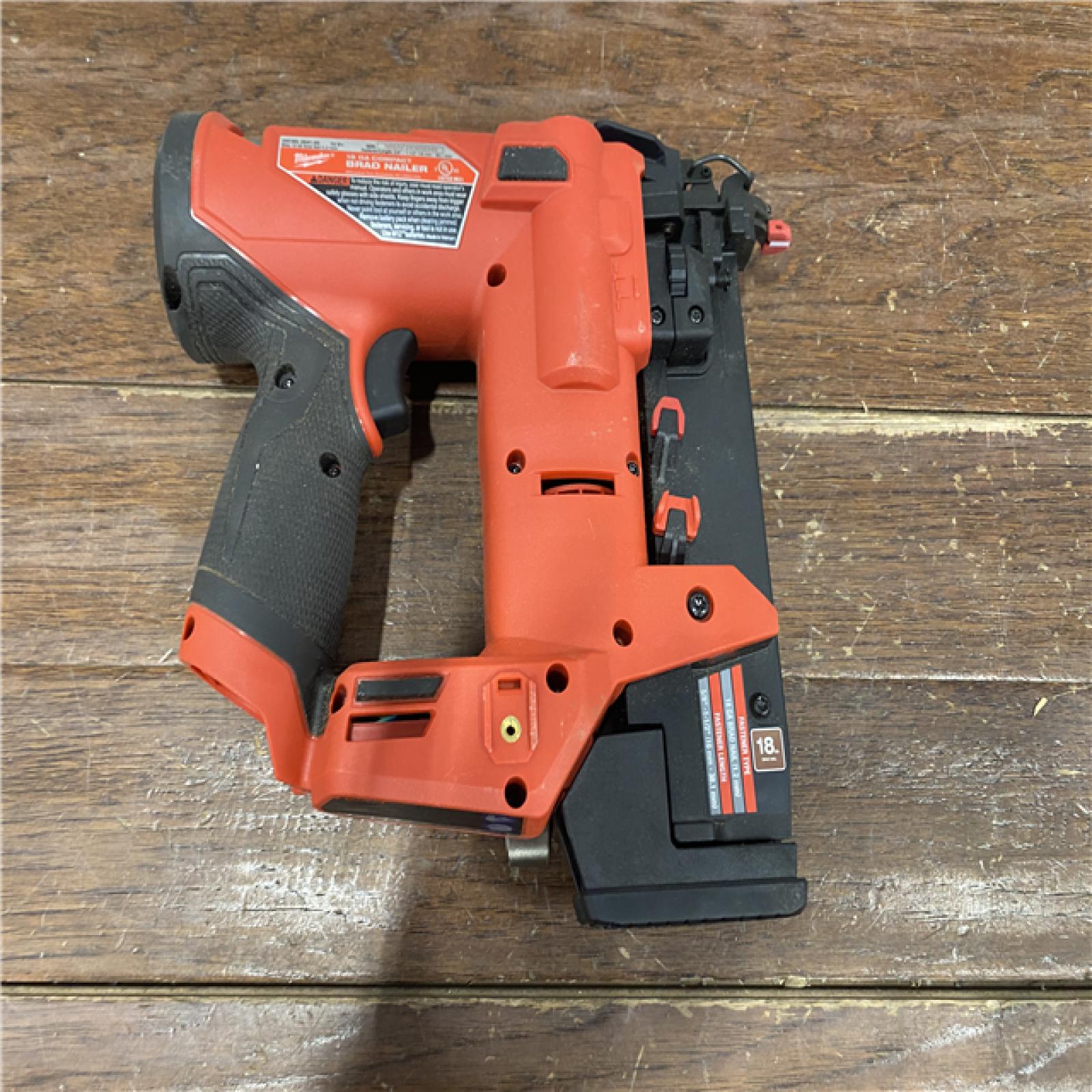 AS-IS M12 FUEL 12-Volt Lithium-Ion Brushless Cordless 18-Guage Compact Brad Nailer (Tool Only)
