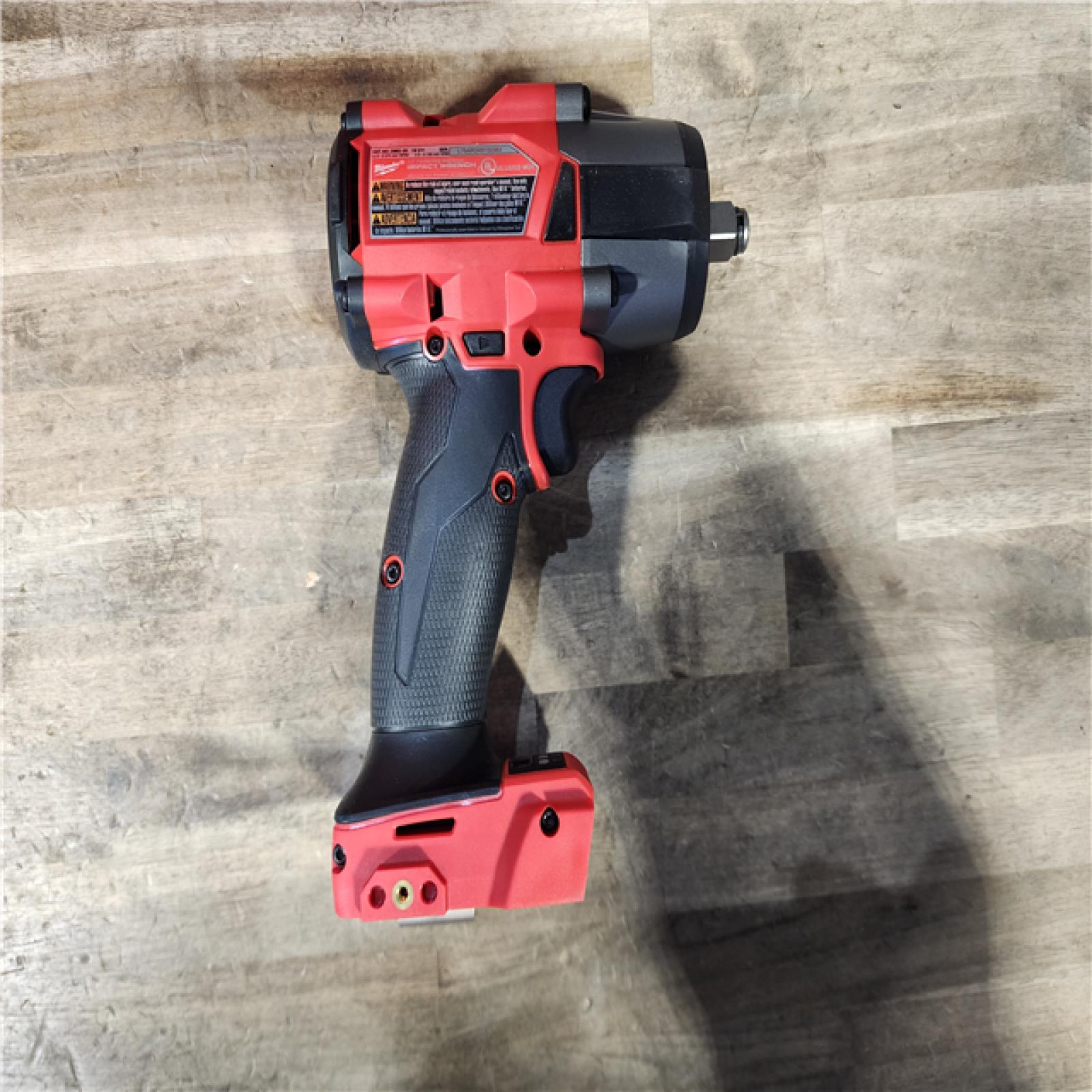 HOUSTON LOCATION - AS-IS (APPEARS LIKE NEW) Milwaukee M18 FUEL 1/2 in. Cordless Brushless Mid-Torque Impact Wrench Kit (Battery & Charger)