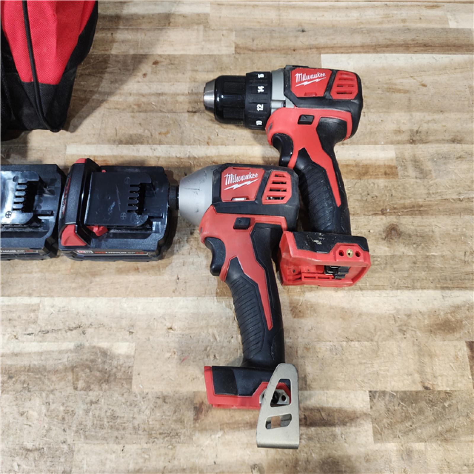 HOUSTON LOCATION - AS - IS Milwaukee 18V Lithium-Ion Cordless Drill Driver/Impact Driver Combo Kit