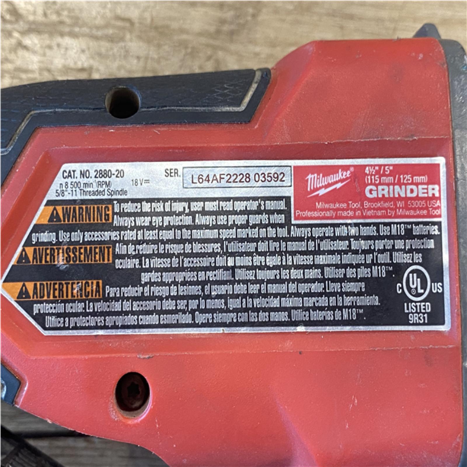 AS-IS Milwaukee FUEL 18V Lithium-Ion Brushless Cordless 4-1/2 in./5 in. Grinder w/Paddle Switch (Tool-Only)