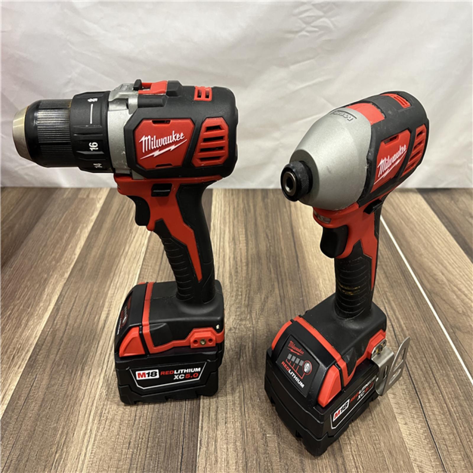 AS-IS Milwaukee M18 FUEL 18V Lithium-Ion Brushless Cordless Hammer Drill and Impact Driver Combo Kit (2-Tool) with 2 Batteries