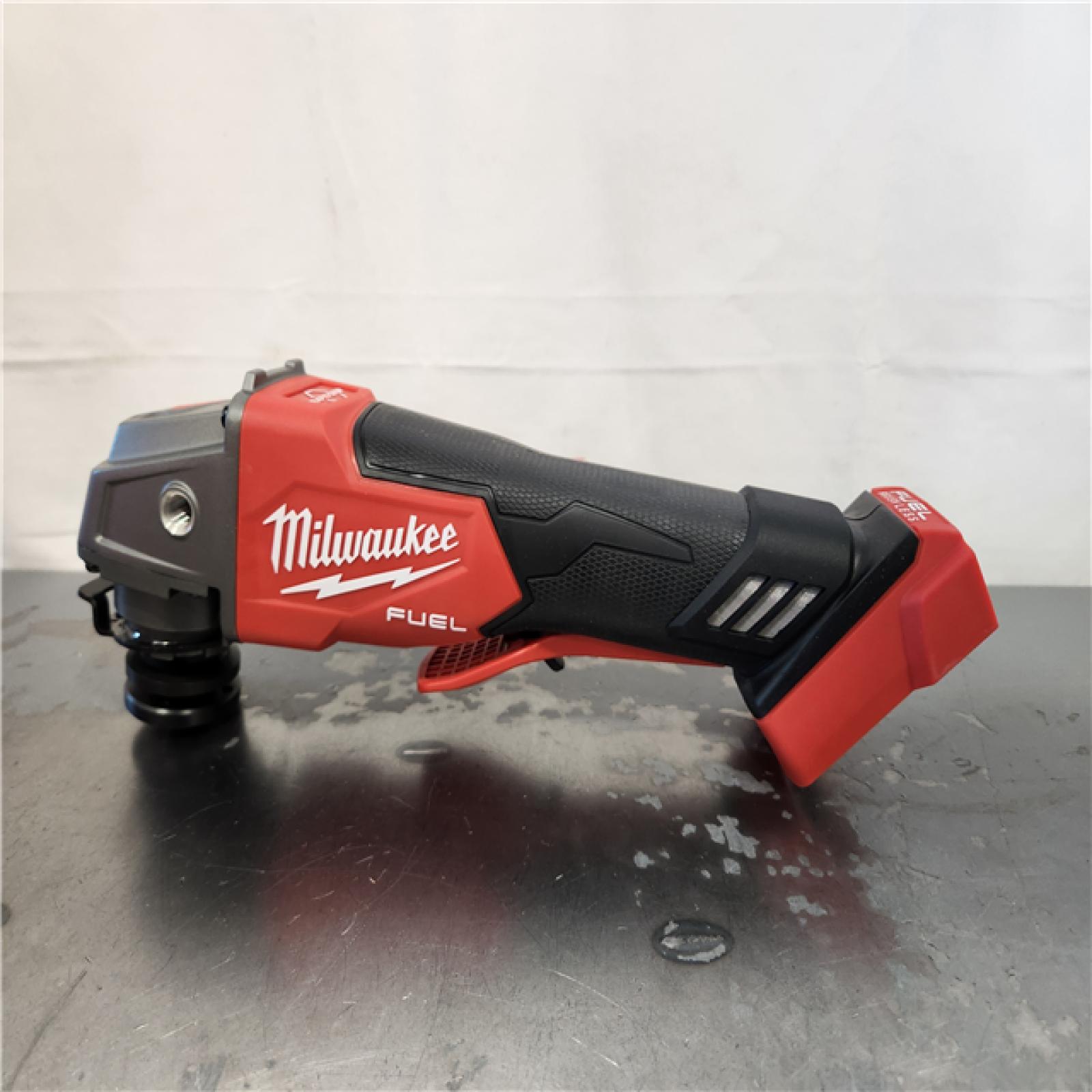 AS-IS- Milwaukee FUEL 18V Lithium-Ion Brushless Cordless 4-1/2 in./5 in. Grinder w/Paddle Switch (Tool-Only)