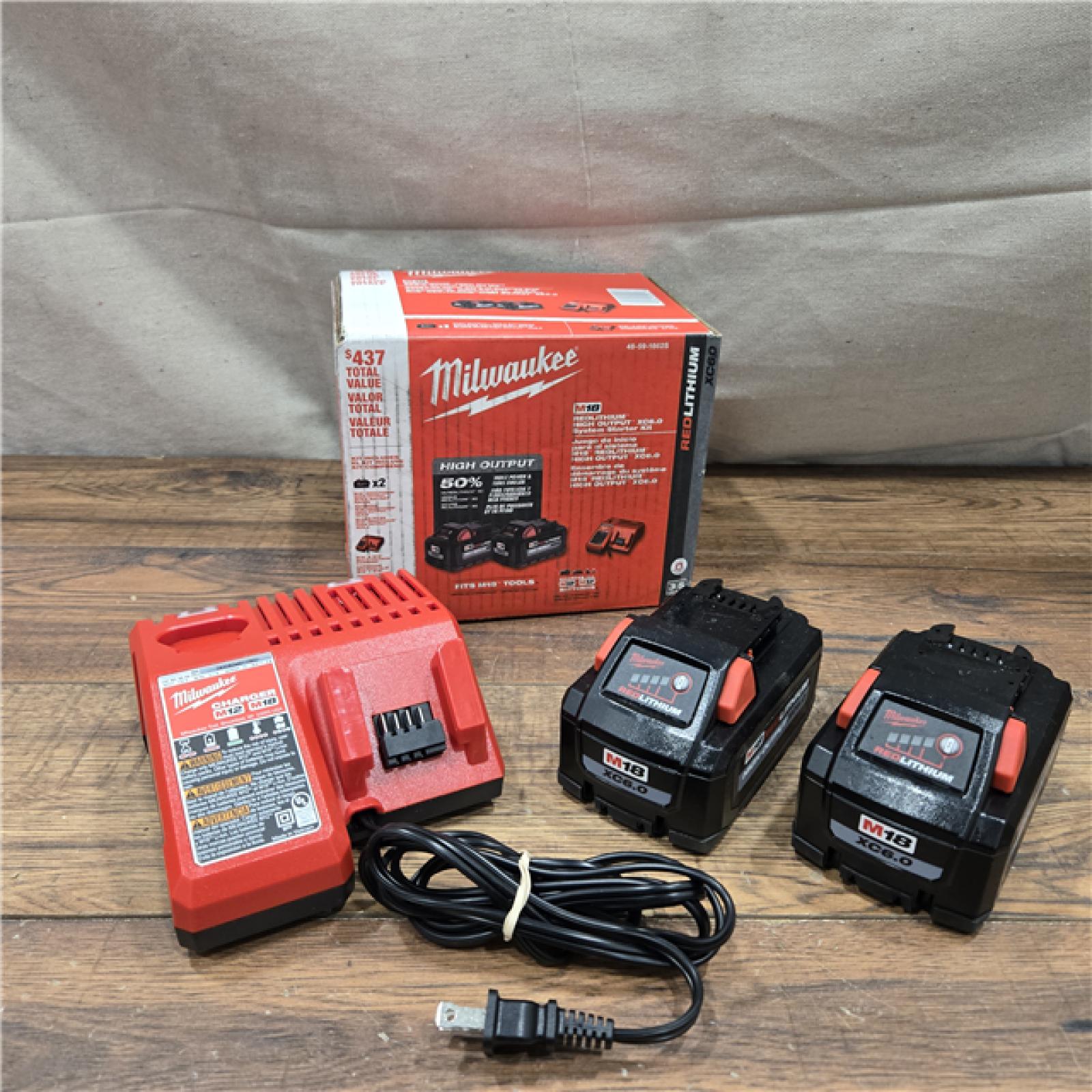AS-IS Milwaukee 18-Volt Lithium-Ion High Output Starter Kit with Two 6.0 Ah Battery and Charger