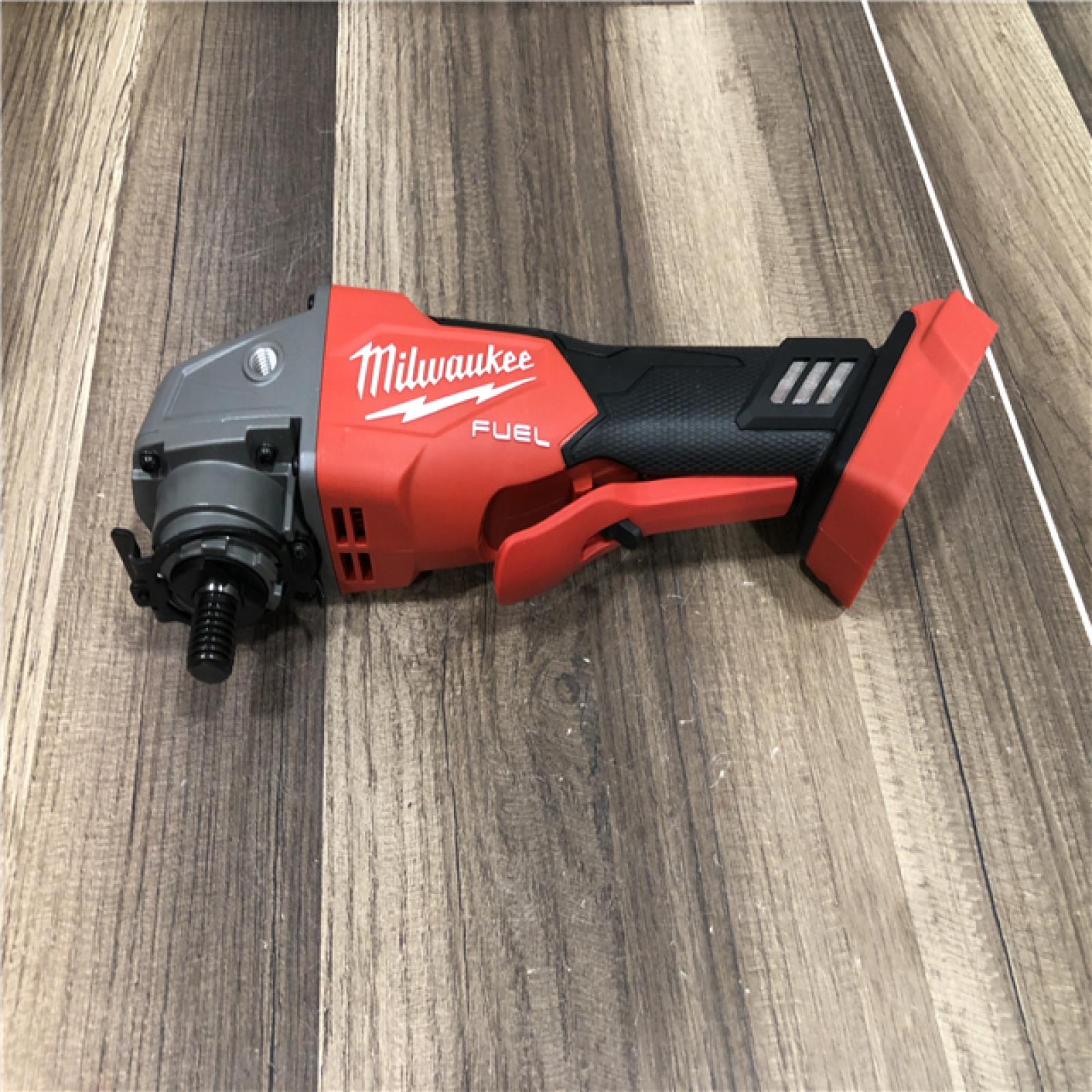 AS-IS Milwaukee FUEL 18V Lithium-Ion Brushless Cordless 4-1/2 in./5 in. Grinder w/Paddle Switch (Tool-Only)