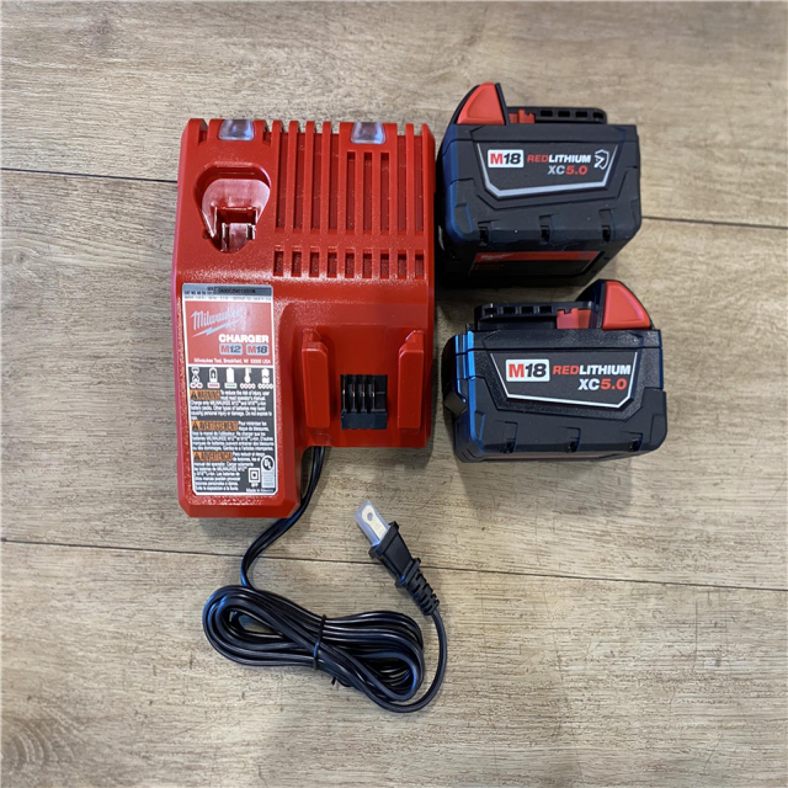 AS-IS Milwaukee FUEL 18V Lithium-Ion Brushless Cordless Hammer Drill and Impact Driver Combo Kit