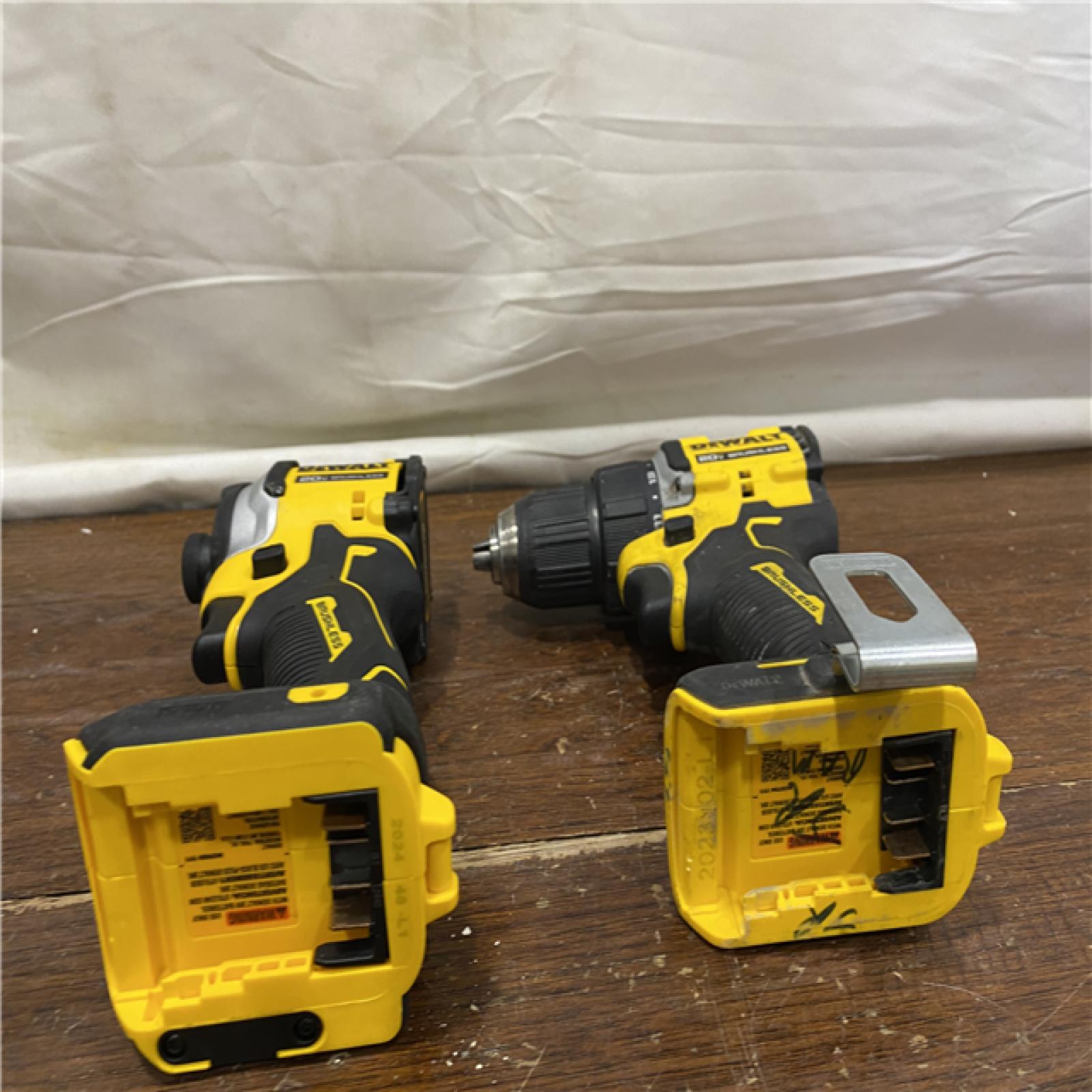 AS-IS DEWALT 20V MAX XR Hammer Drill and ATOMIC Impact Driver 2 Tool Cordless Combo Kit with (2) 4.0Ah Batteries, Charger, and Bag