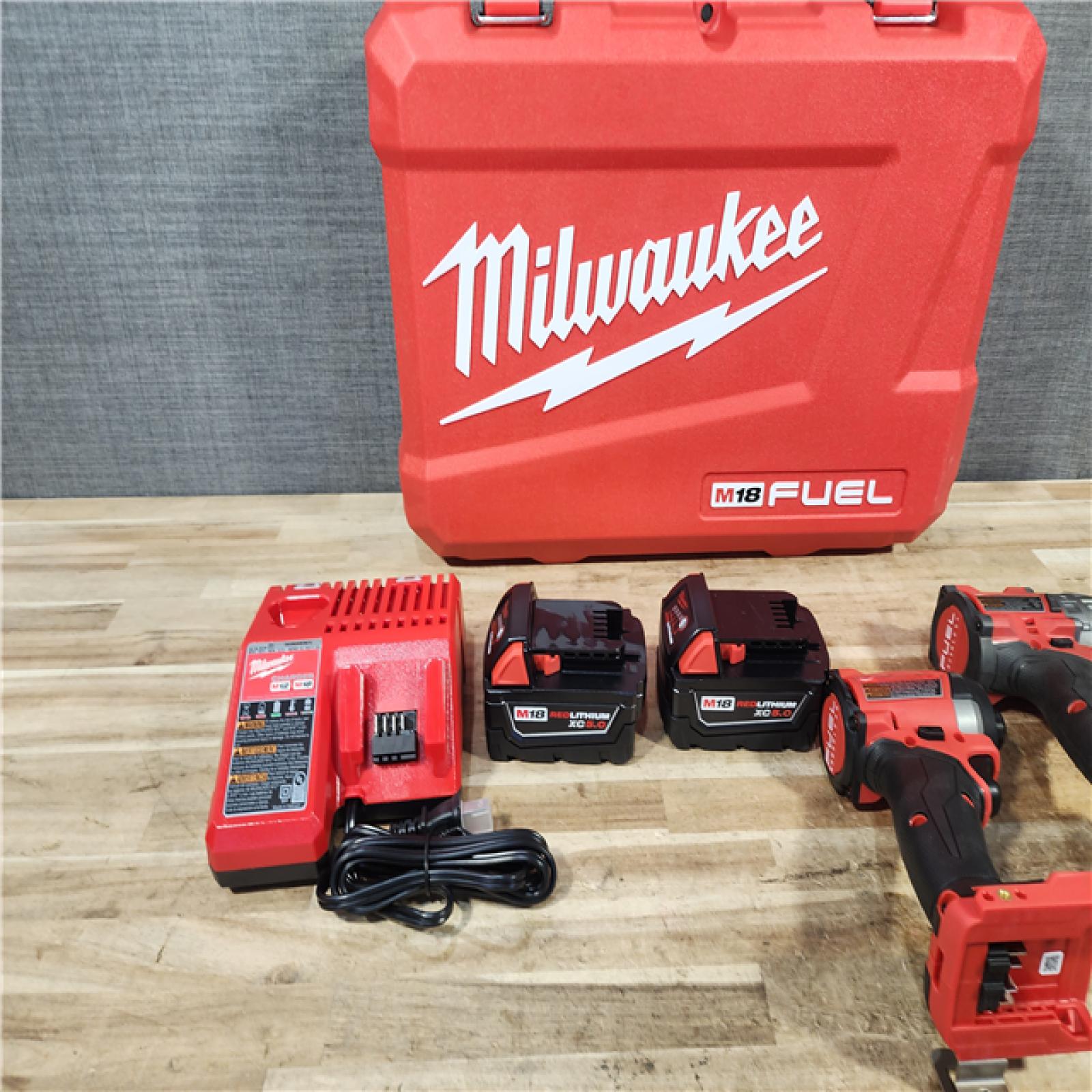 HOUSTON LOCATION - AS - IS Milwaukee FUEL 18V Lithium-Ion Brushless Cordless Hammer Drill and Impact Driver Combo Kit