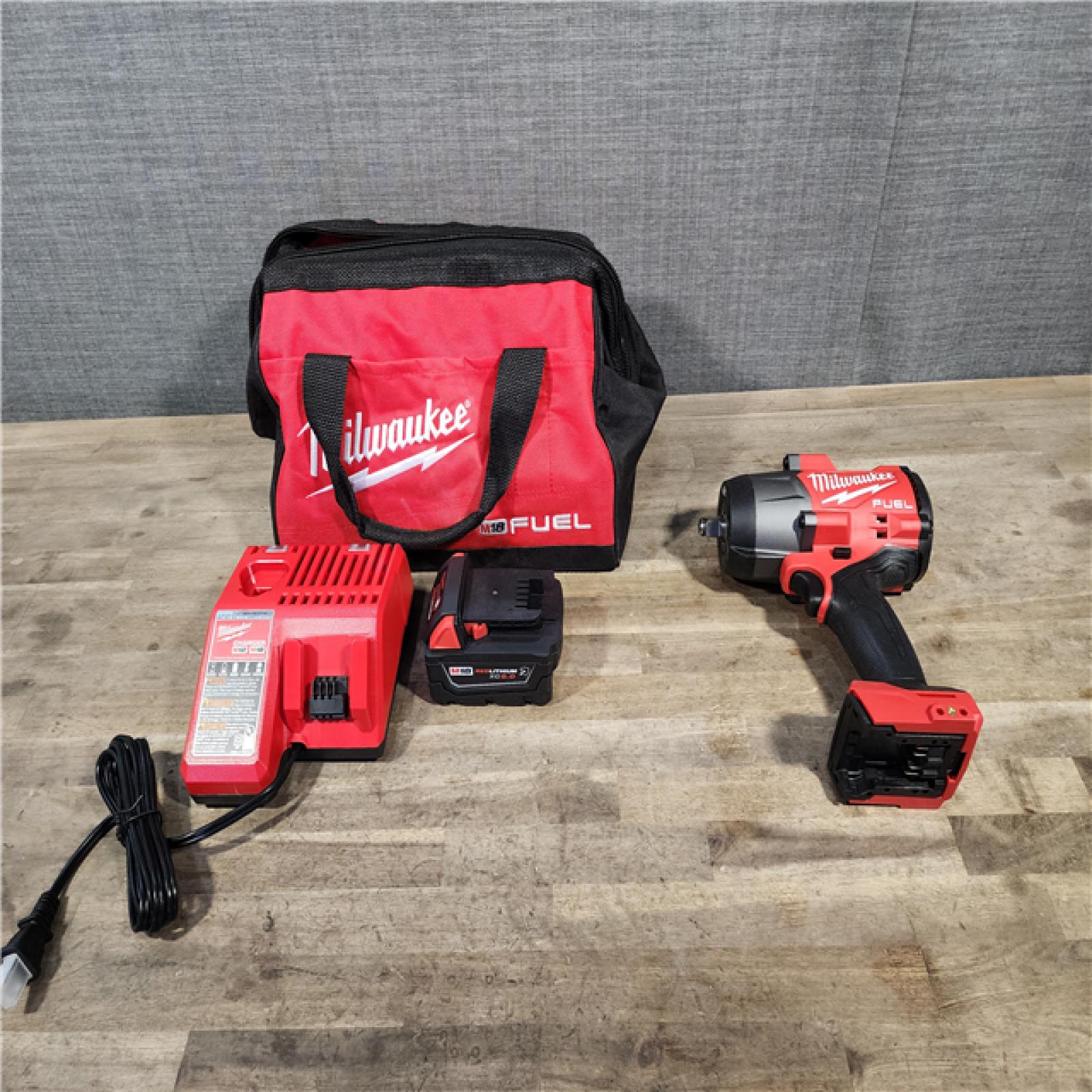 HOUSTON LOCATION - AS-IS Milwaukee M18 1/2 in. Cordless Brushless High Torque Impact Wrench Kit (Battery & Charger)