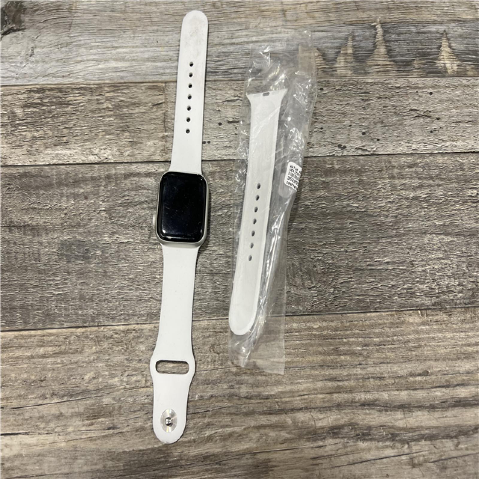 AS-IS  Apple Watch SE (GPS+Cellular, 40mm) - Silver Aluminum Case - White Sport Band