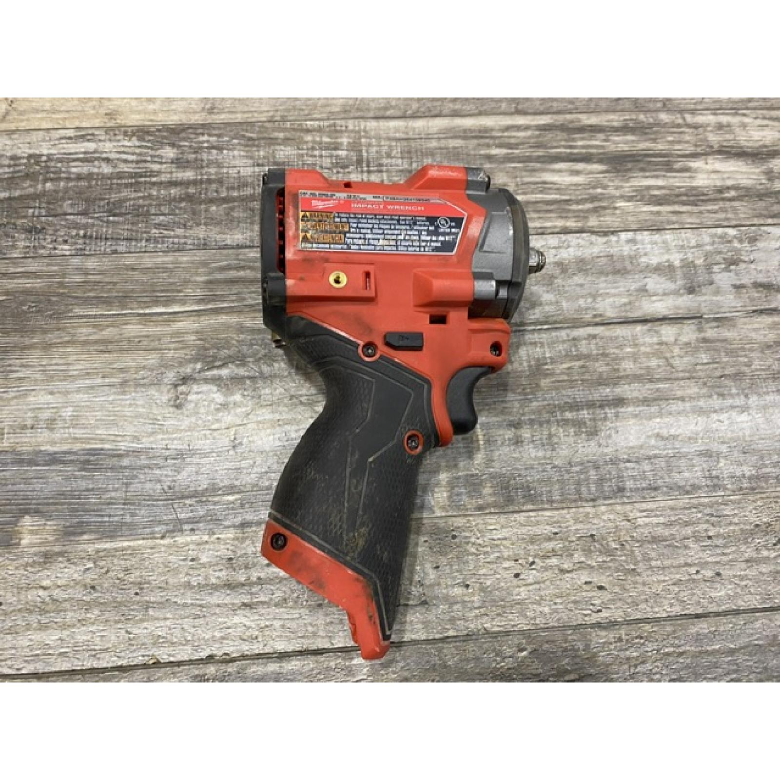 AS-IS Milwaukee FUEL 12V Lithium-Ion Brushless Cordless Stubby 3/8 in. Impact Wrench (Tool-Only)