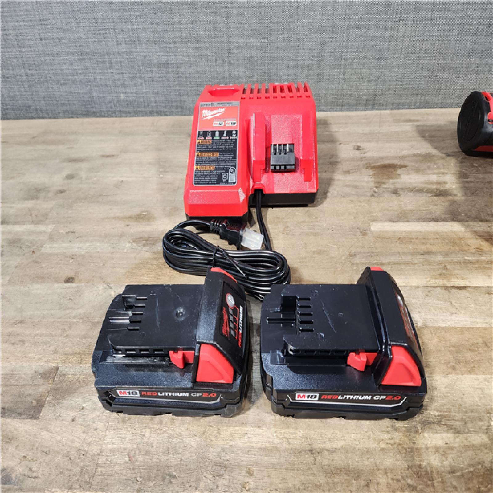 HOUSTON LOCATION - AS-IS MILWAUKEE 4 TOOL COMBO KIT W/ (2) BATTERY & CHARGER