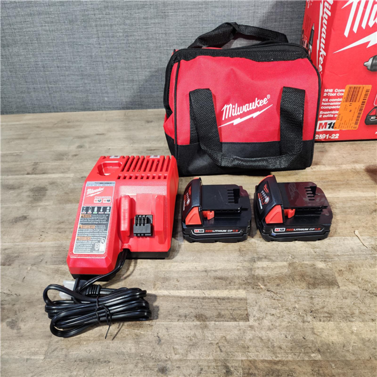 HOUSTON LOCATION - AS-IS Milwaukee 18V Cordless Brushed 2-Tool Drill/Driver and Impact Driver Kit