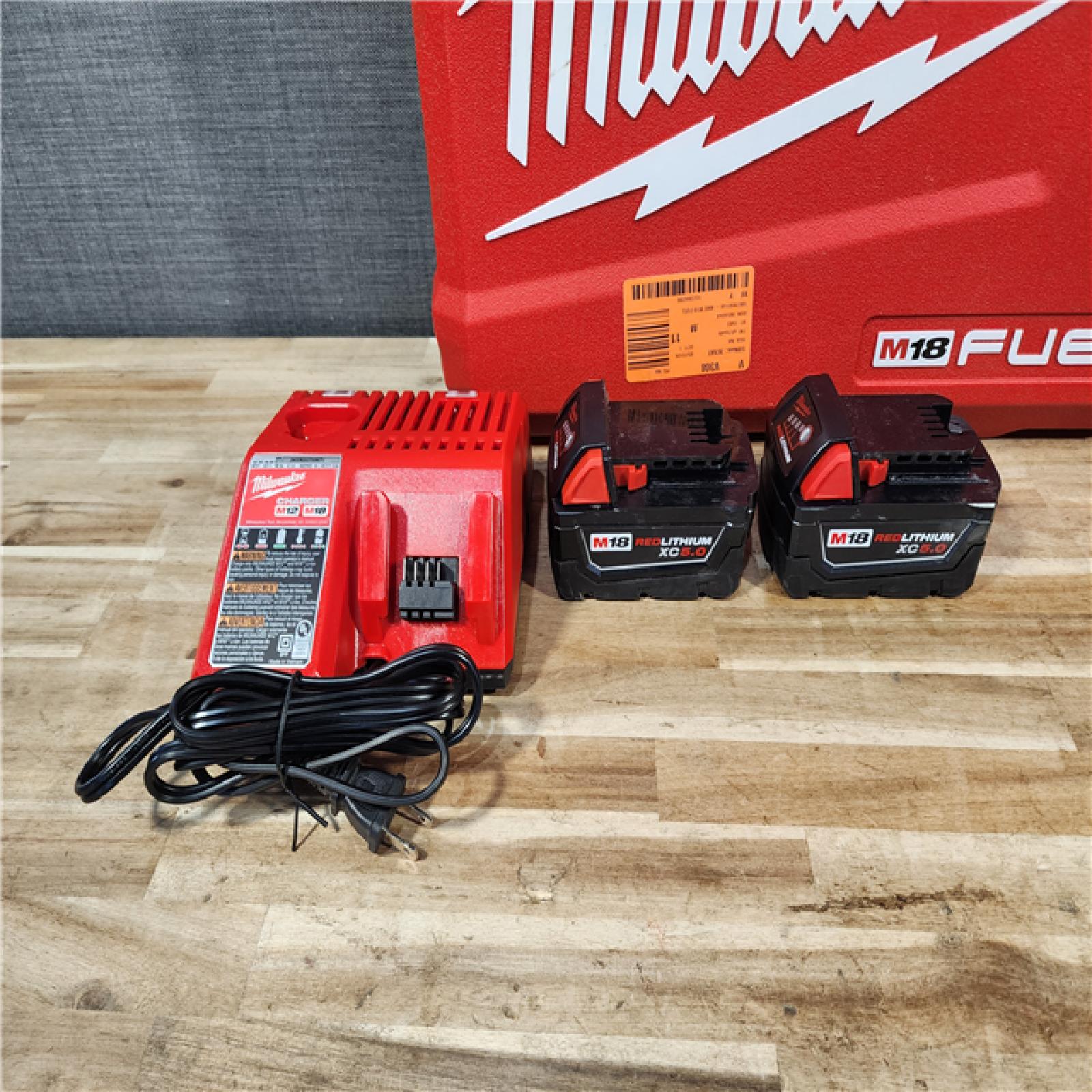 HOUSTON LOCATION - AS-IS Milwaukee FUEL 18V Lithium-Ion Brushless Cordless Hammer Drill and Impact Driver Combo Kit