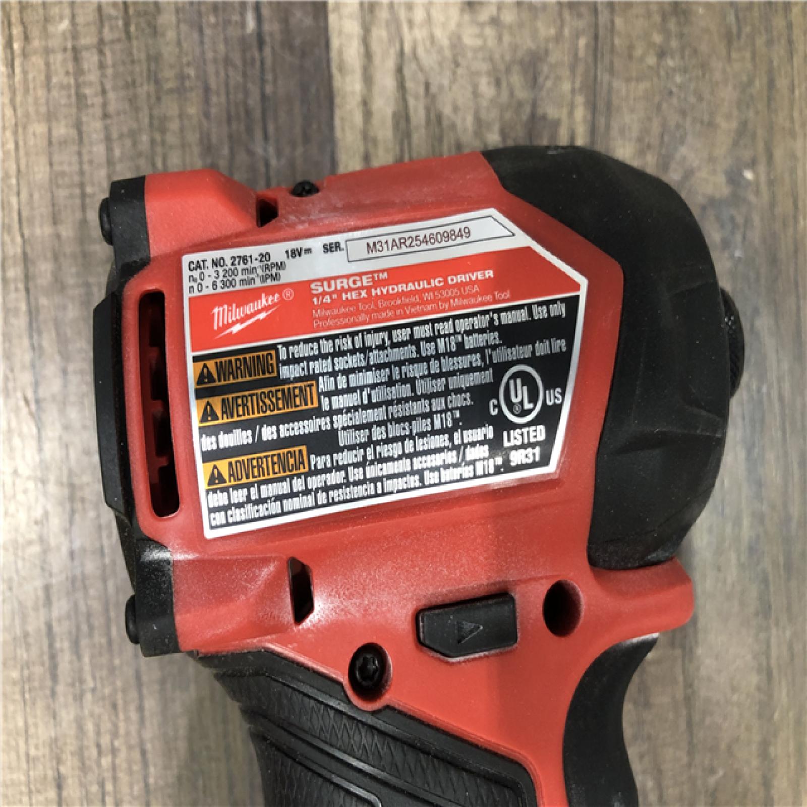 AS-IS Milwaukee FUEL SURGE 18V Lithium-Ion Brushless Cordless 1/4 in. Hex Impact Driver (Tool-Only)