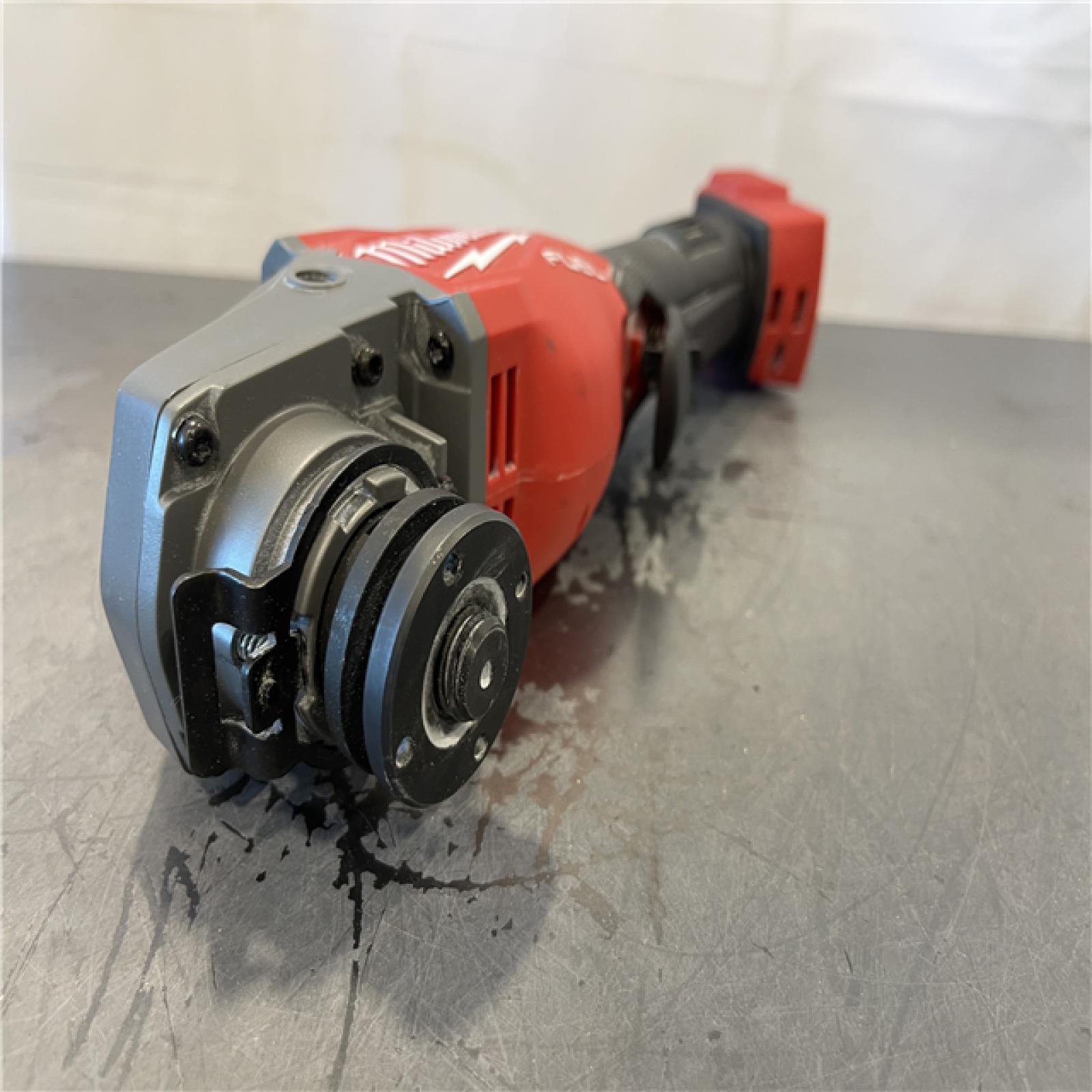 AS-IS - Milwaukee M18 FUEL 18-Volt Lithium-Ion Brushless Cordless 4-1/2 in./6 in. Braking Grinder with Paddle Switch