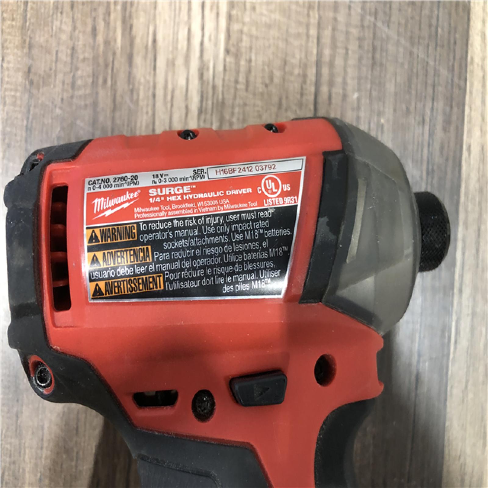 AS-IS Milwaukee  FUEL SURGE 18V Lithium-Ion Brushless Cordless 1/4 in. Hex Impact Driver (Tool-Only)