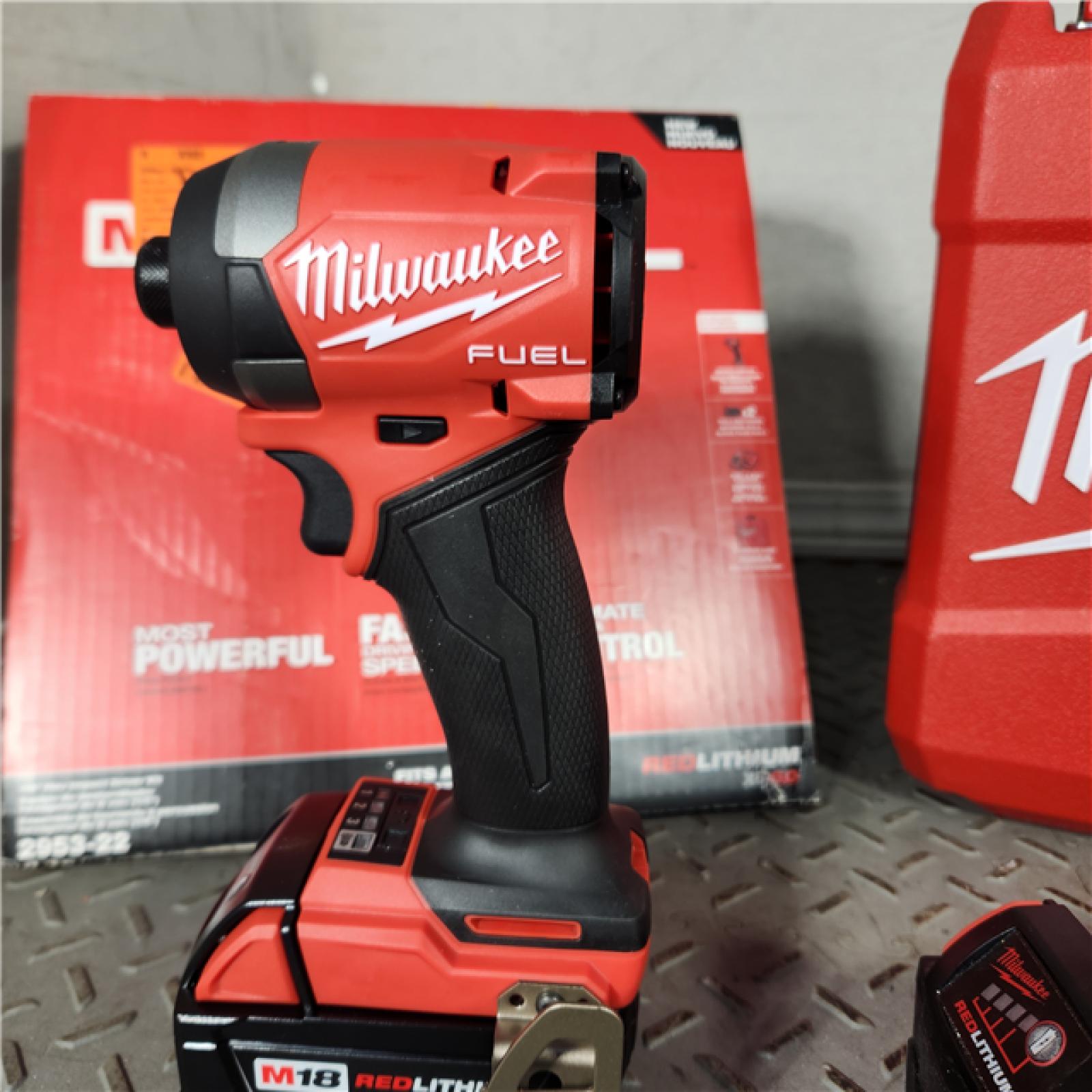 Houston location- AS-IS Milwaukee M18 FUEL 1/4 Hex Impact Driver Kit Appears in new condition