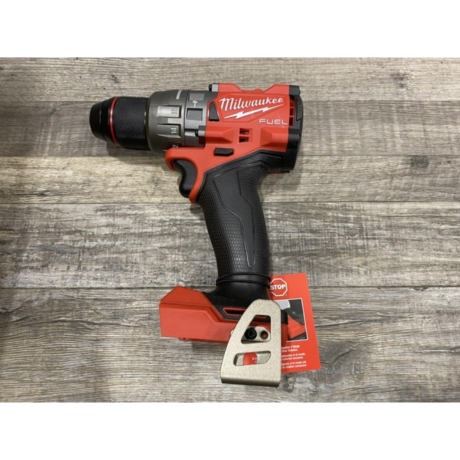 AS-IS Milwaukee FUEL 18V Lithium-Ion Brushless Cordless 1/2 in. Hammer Drill Driver Kit
