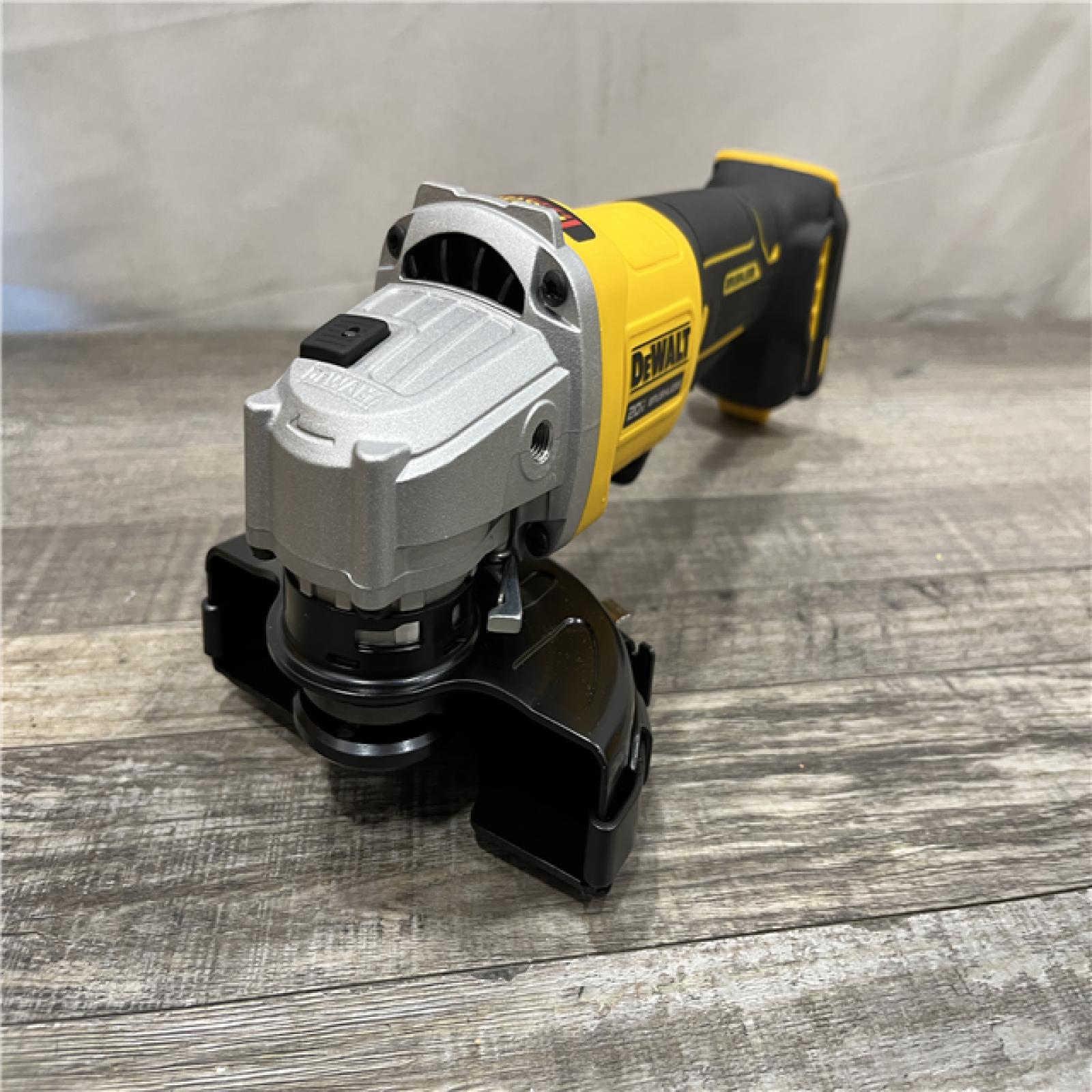 AS-IS DEWALT 20V MAX Cordless Brushless 4-1/2 in. Angle Grinder with Paddle Switch (Tool Only)