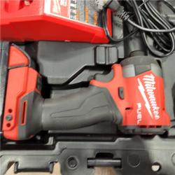 AS-IS MILWAUKEE   M18 FUEL 18V Lithium-Ion Brushless Cordless Hammer Drill and Impact Driver Combo Kit (2-Tool) with 2 Batteries