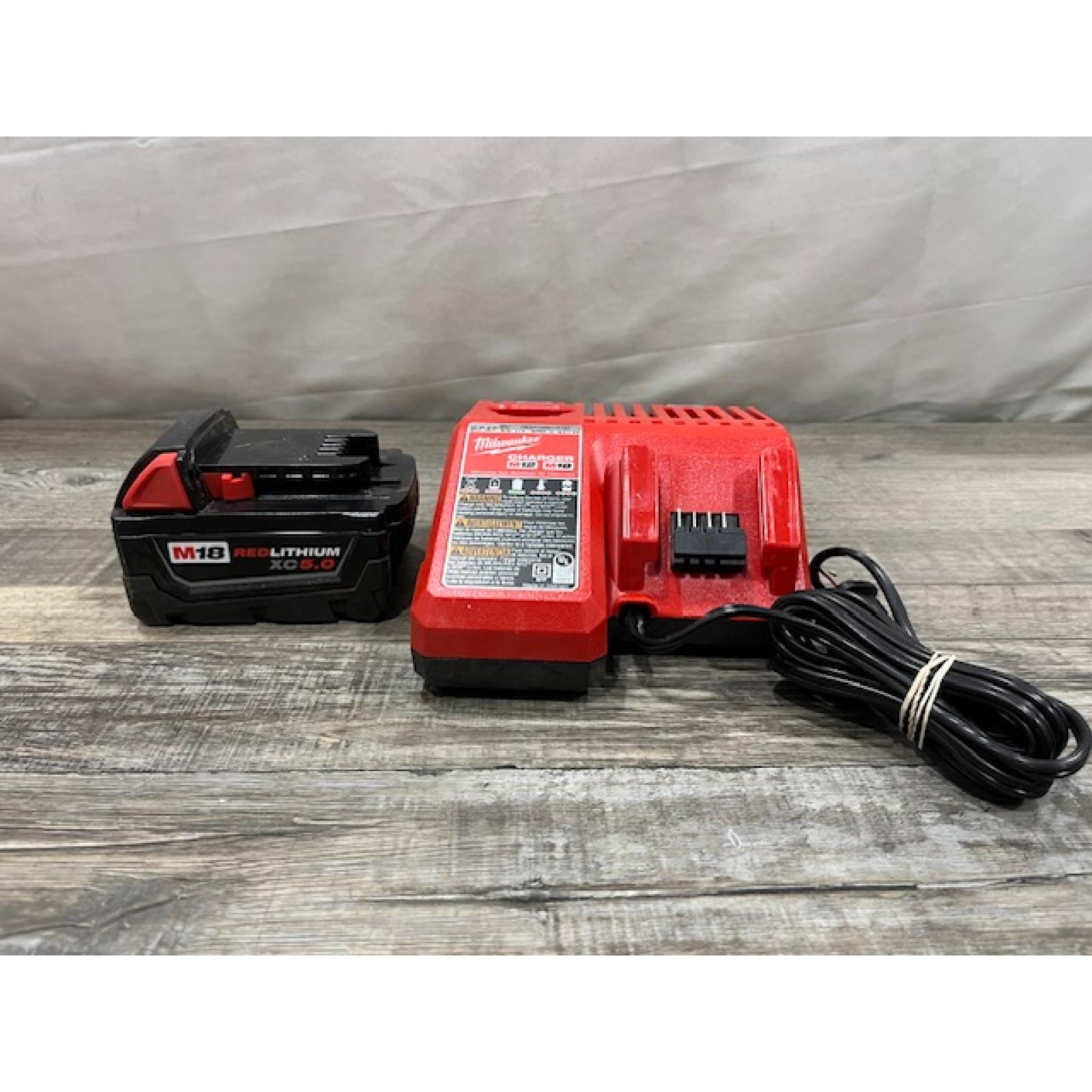 AS-IS Milwaukee 18-Volt Lithium-Ion XC Starter Kit with One 5.0Ah Battery and Charger