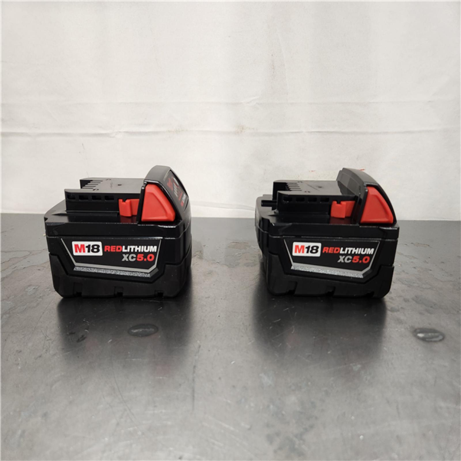 AS-IS- Milwaukee  18-Volt Lithium-Ion XC Starter Kit with Two 5.0Ah Batteries and Charger