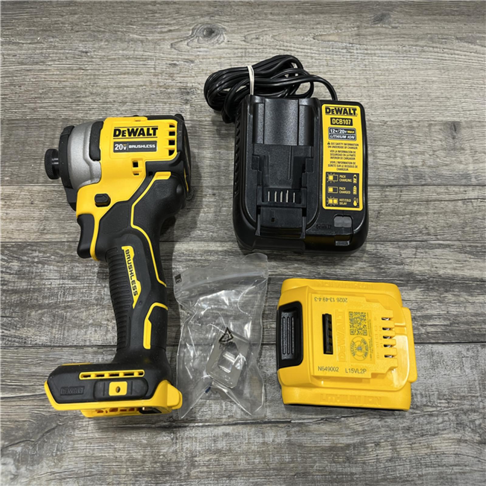 AS-IS DEWALT Atomic 20V Max Lithium-Ion Brushless Cordless Compact 1/4 in. Impact Driver Kit