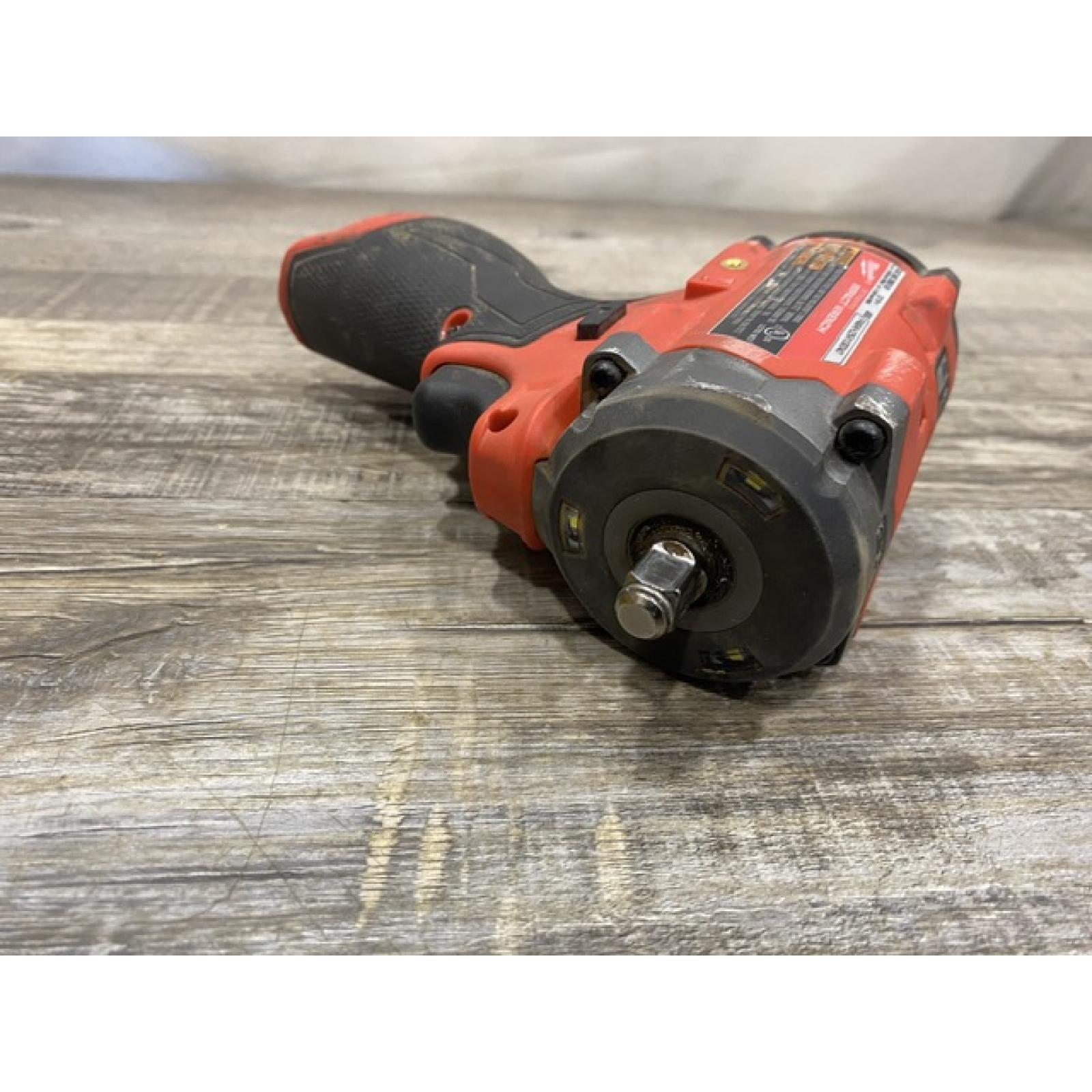 AS-IS Milwaukee FUEL 12V Lithium-Ion Brushless Cordless Stubby 3/8 in. Impact Wrench (Tool-Only)