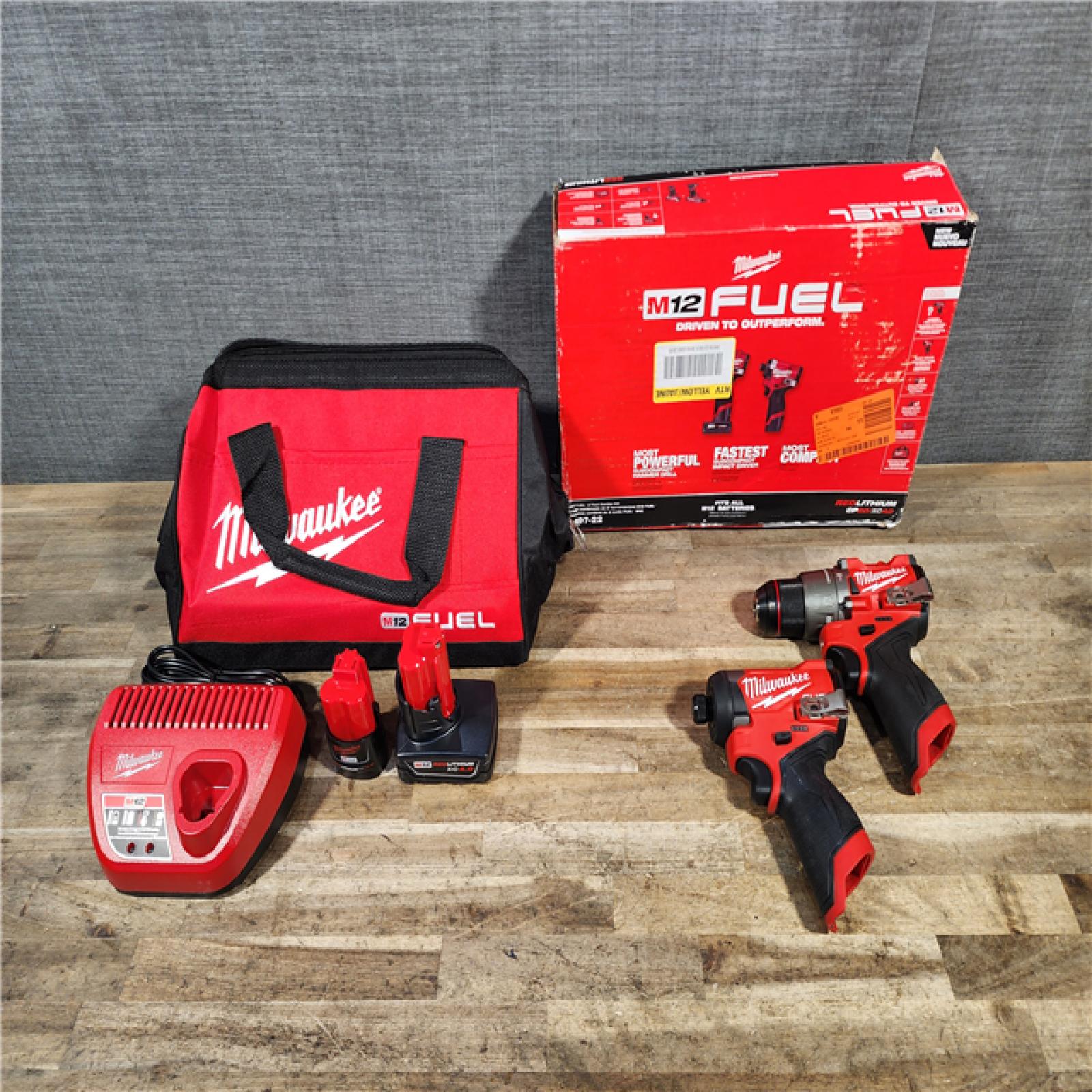 HOUSTON LOCATION - AS-IS Milwaukee FUEL 12-Volt Lithium-Ion Brushless Cordless Hammer Drill and Impact Driver Combo Kit