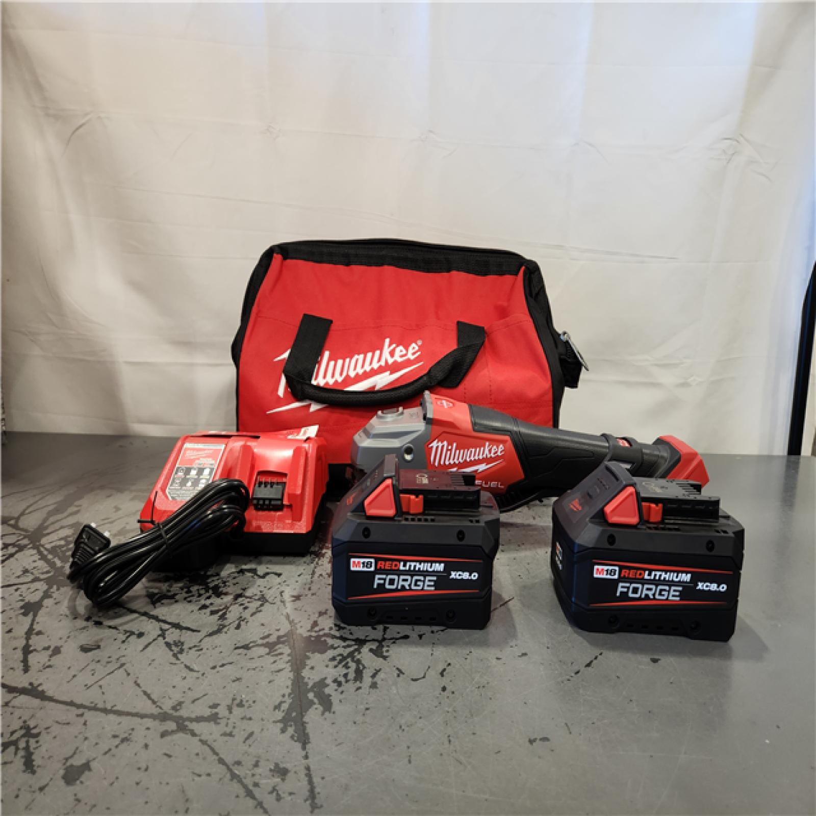 AS-IS- M18 FUEL 18-Volt Lithium-Ion Brushless Cordless 4-1/2 in./6 in. Braking Grinder W/Paddle Switch & Two XC 8.0 Ah Battery