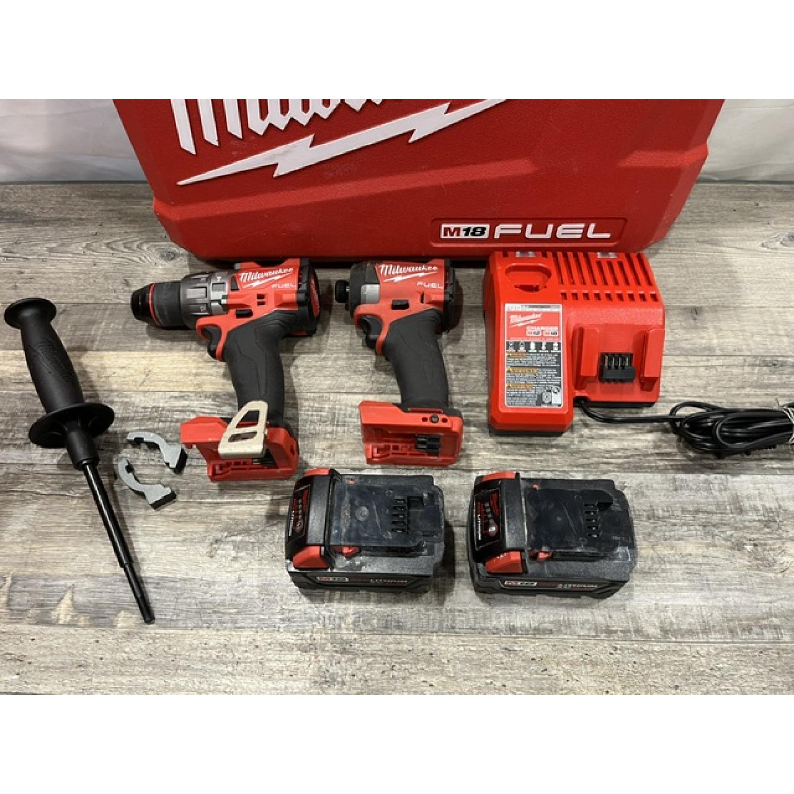 AS-IS Milwaukee FUEL 18V Lithium-Ion Brushless Cordless Hammer Drill and Impact Driver Combo Kit
