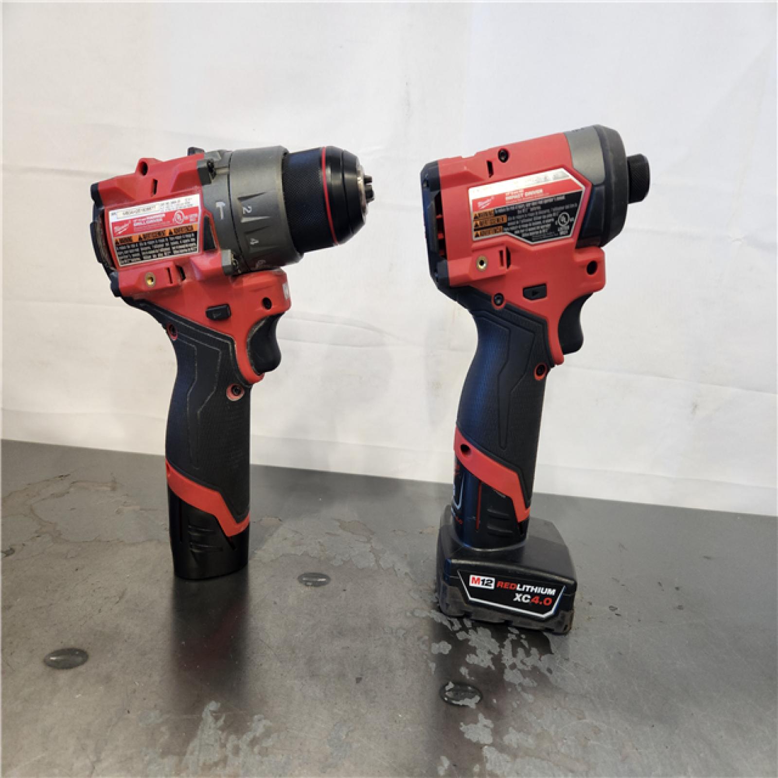 AS-IS- Milwaukee 18V Cordless Brushed 2-Tool Drill/Driver and Impact Driver Kit